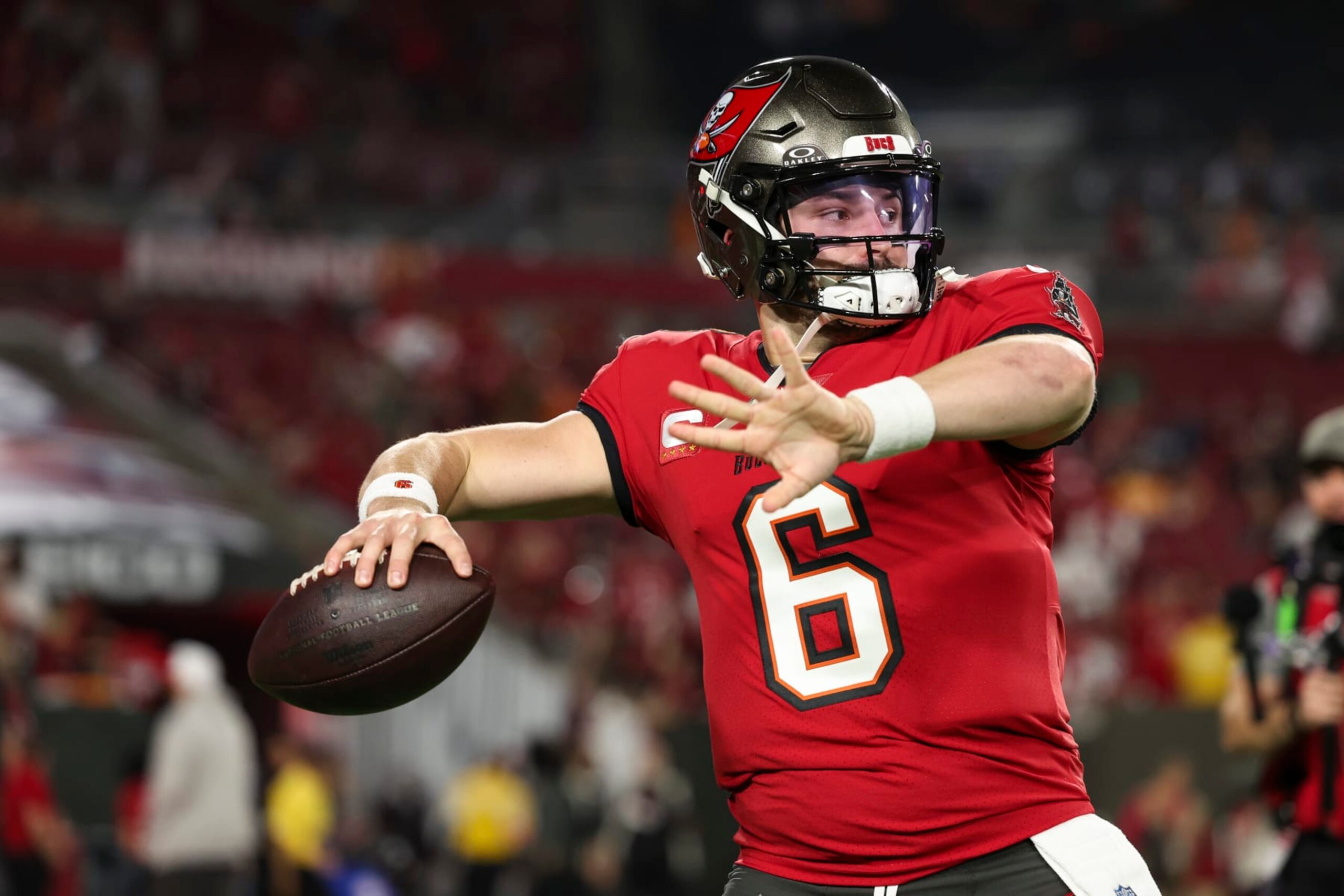 TAMPA, FL - JANUARY 15: Baker Mayfield #6 of the Tampa Bay Buccaneers warms up prior to an NFL Wild Card playoff football game against the Philadelphia Eagles at Raymond James Stadium on January 15, 2024 in Tampa, Florida. (Photo by Perry Knotts/Getty Images)