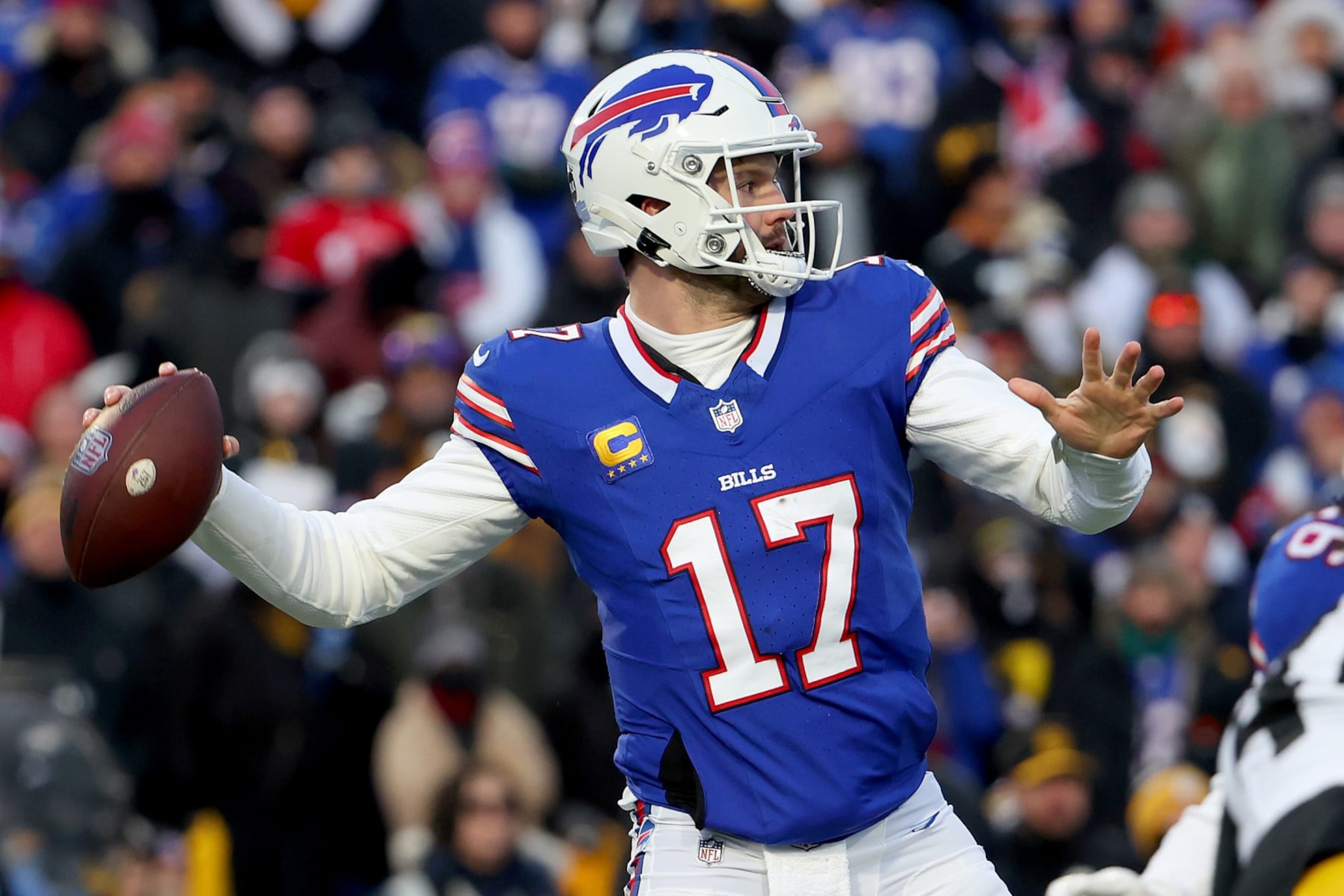 ORCHARD PARK, NEW YORK - JANUARY 15: Josh Allen #17 of the Buffalo Bills passes against the Pittsburgh Steelers during the first quarter at Highmark Stadium on January 15, 2024 in Orchard Park, New York. (Photo by Timothy T Ludwig/Getty Images)