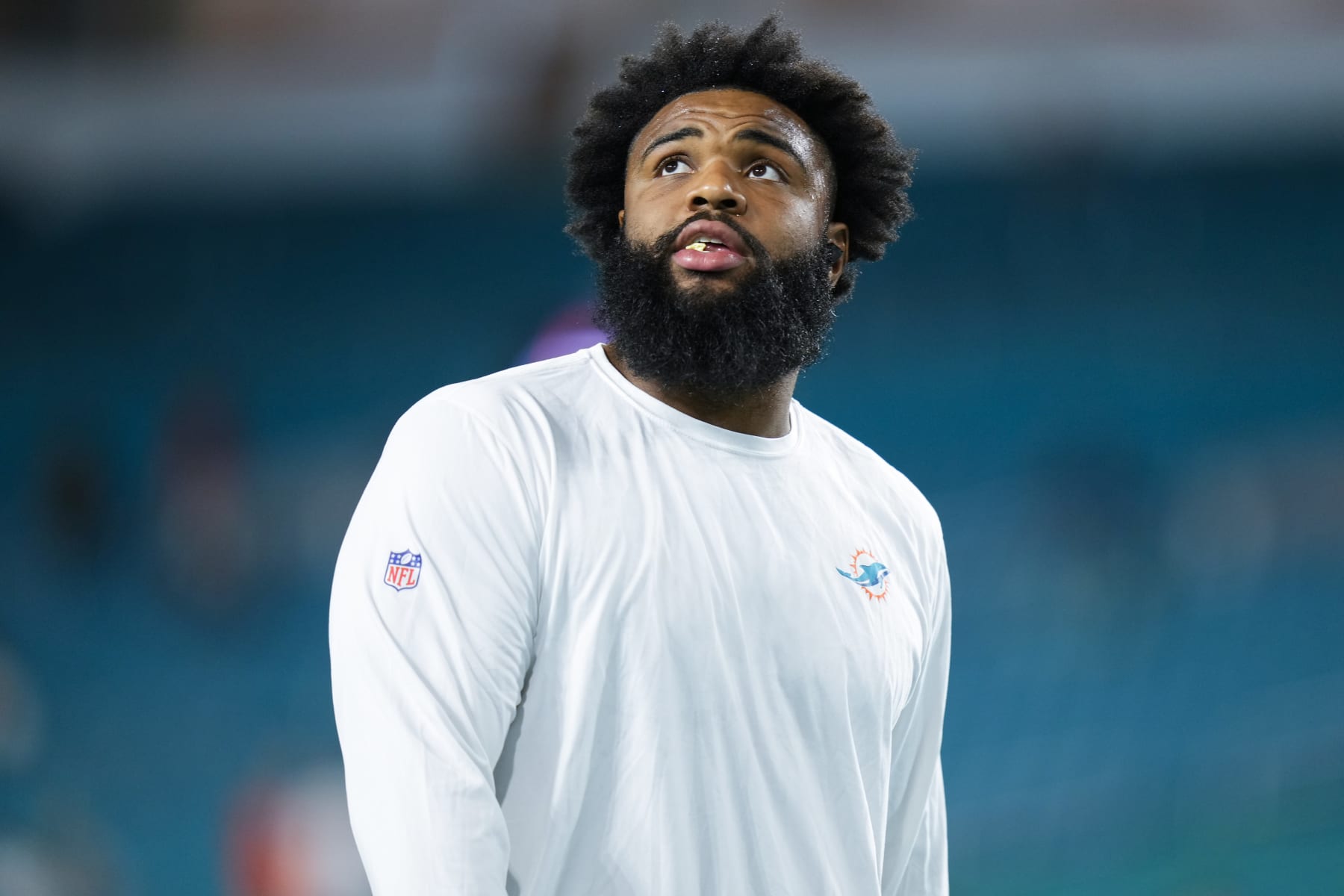 MIAMI GARDENS, FLORIDA - DECEMBER 11: Christian Wilkins #94 of the Miami Dolphins warms up prior to a game against the Tennessee Titans at Hard Rock Stadium on December 11, 2023 in Miami Gardens, Florida. (Photo by Rich Storry/Getty Images)