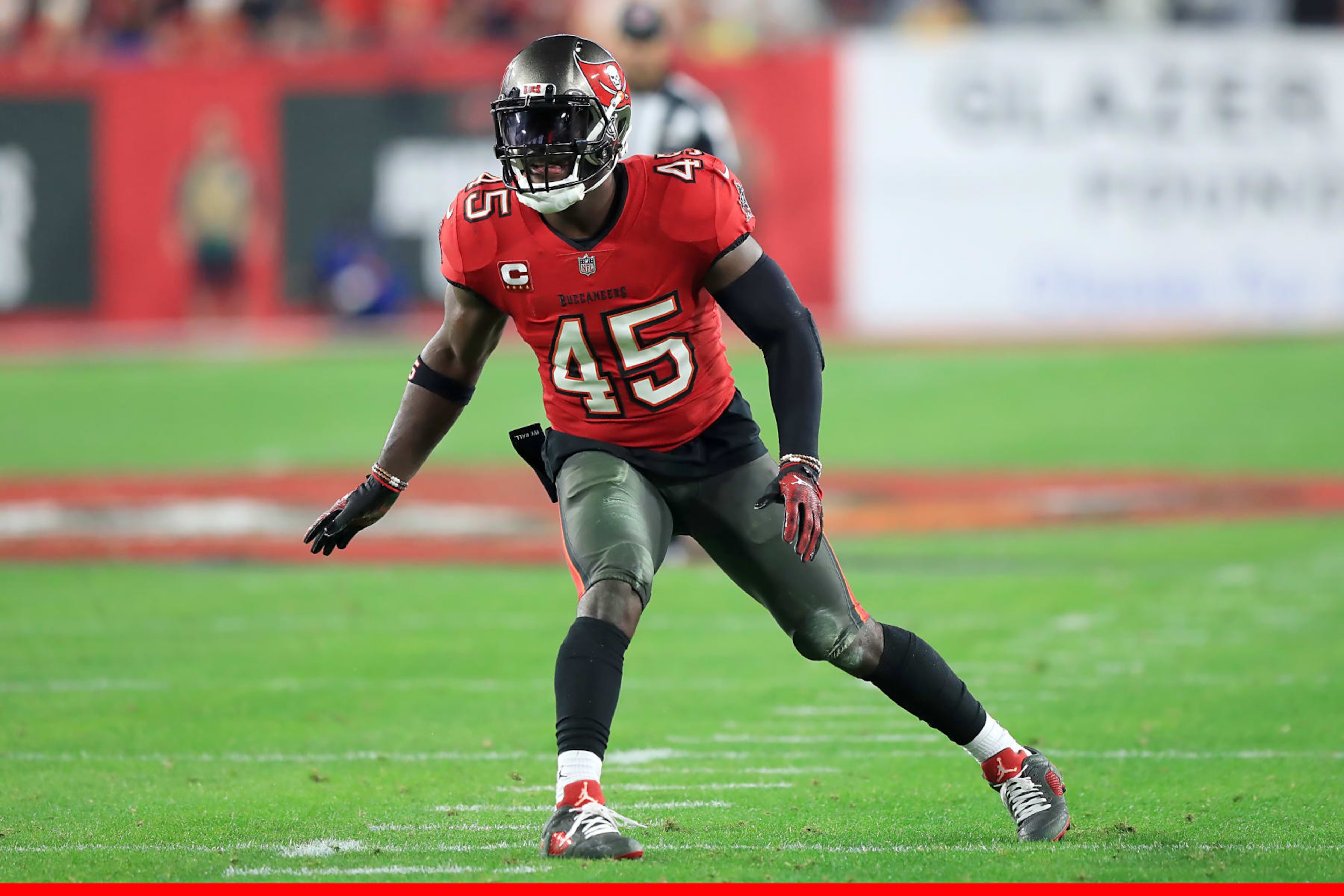 TAMPA, FL - JANUARY 15: Tampa Bay Buccaneers Linebacker Devin White (45) drops back into coverage during the NFC Wild Card game between the Philadelphia Eagles and the Tampa Bay Buccaneers on January 15, 2024 at Raymond James Stadium in Tampa, Florida. (Photo by Cliff Welch/Icon Sportswire via Getty Images) TAMPA, FL - JANUARY 15: Tampa Bay Buccaneers Linebacker Devin White (45) drops back into coverage during the NFC Wild Card game between the Philadelphia Eagles and the Tampa Bay Buccaneers on January 15, 2024 at Raymond James Stadium in Tampa, Florida. (Photo by Cliff Welch/Icon Sportswire via Getty Images)