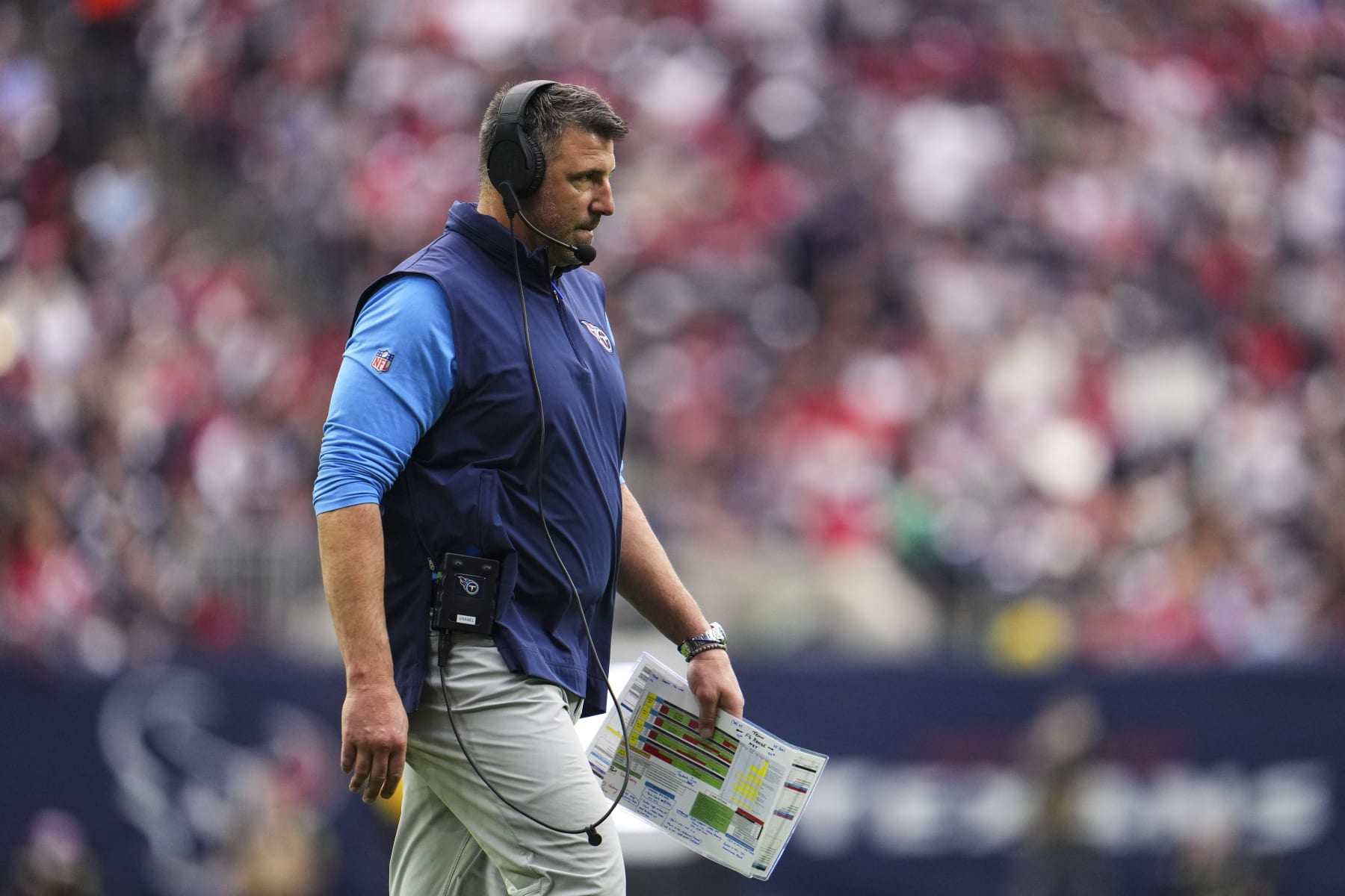 HOUSTON, TX - DECEMBER 31: Tennessee Titans head coach Mike Vrabel looks on from the sideline during an NFL football game against the Houston Texans at NRG Stadium on December 31, 2023 in Houston, Texas. (Photo by Cooper Neill/Getty Images)