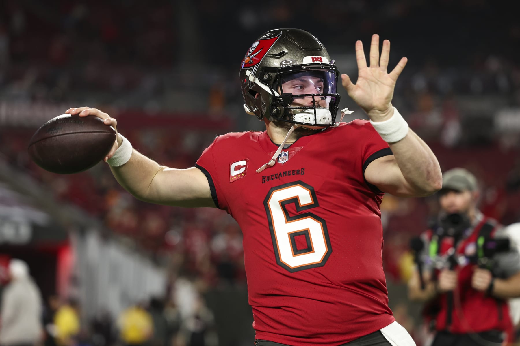 TAMPA, FL - JANUARY 15: Baker Mayfield #6 of the Tampa Bay Buccaneers warms up prior to an NFL Wild Card playoff football game against the Philadelphia Eagles at Raymond James Stadium on January 15, 2024 in Tampa, Florida. (Photo by Perry Knotts/Getty Images) TAMPA, FL - JANUARY 15: Baker Mayfield #6 of the Tampa Bay Buccaneers warms up prior to an NFL Wild Card playoff football game against the Philadelphia Eagles at Raymond James Stadium on January 15, 2024 in Tampa, Florida. (Photo by Perry Knotts/Getty Images)