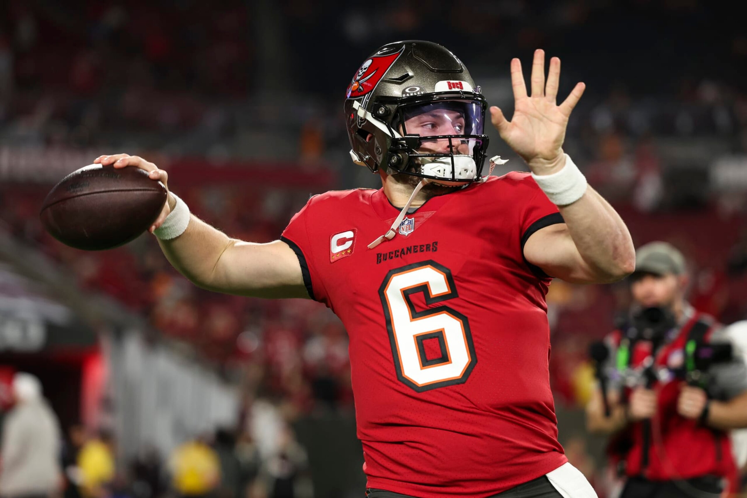 TAMPA, FL - JANUARY 15: Baker Mayfield #6 of the Tampa Bay Buccaneers warms up prior to an NFL Wild Card playoff football game against the Philadelphia Eagles at Raymond James Stadium on January 15, 2024 in Tampa, Florida. (Photo by Perry Knotts/Getty Images)