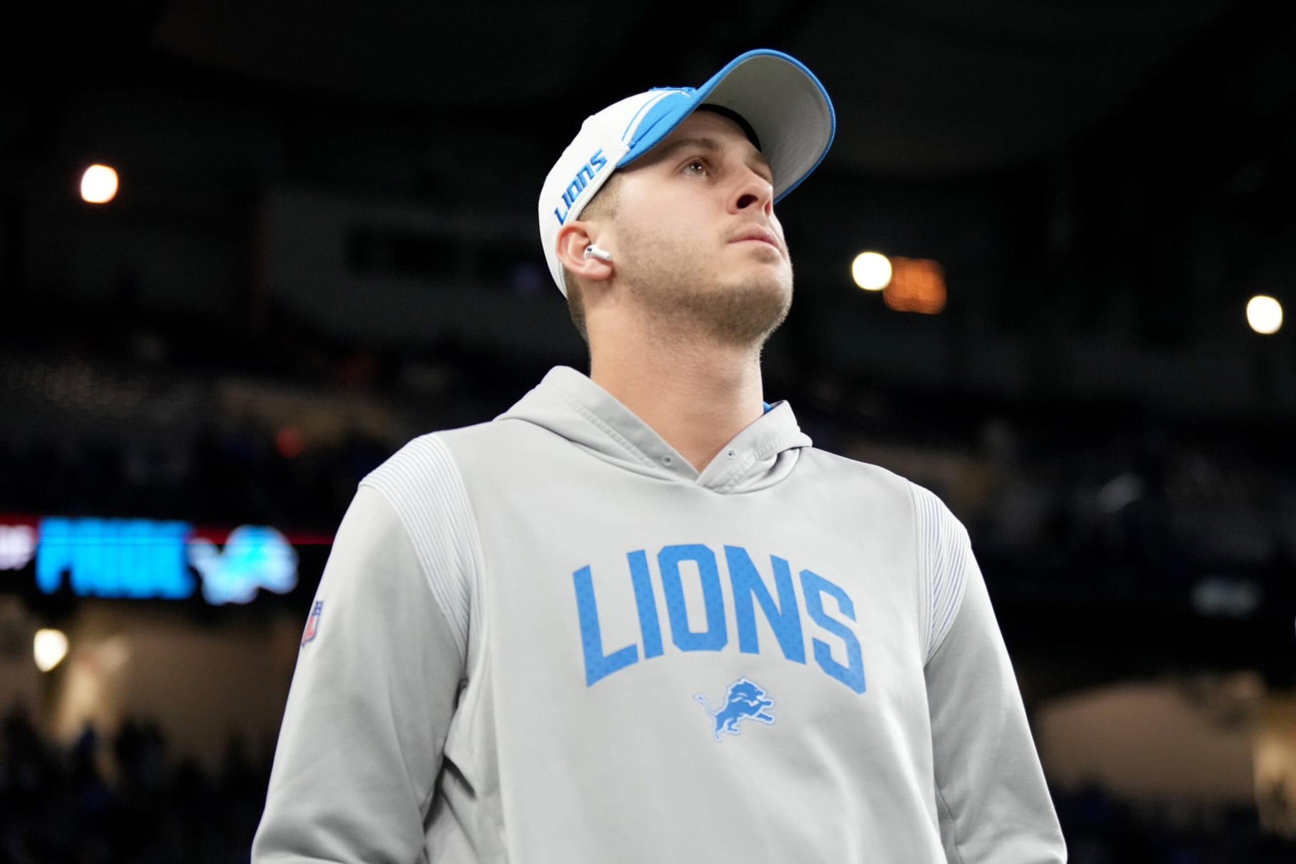 DETROIT, MICHIGAN - JANUARY 14: Jared Goff #16 of the Detroit Lions looks on prior to a game against the Los Angeles Rams in the NFC Wild Card Playoffs at Ford Field on January 14, 2024 in Detroit, Michigan. (Photo by Nic Antaya/Getty Images)