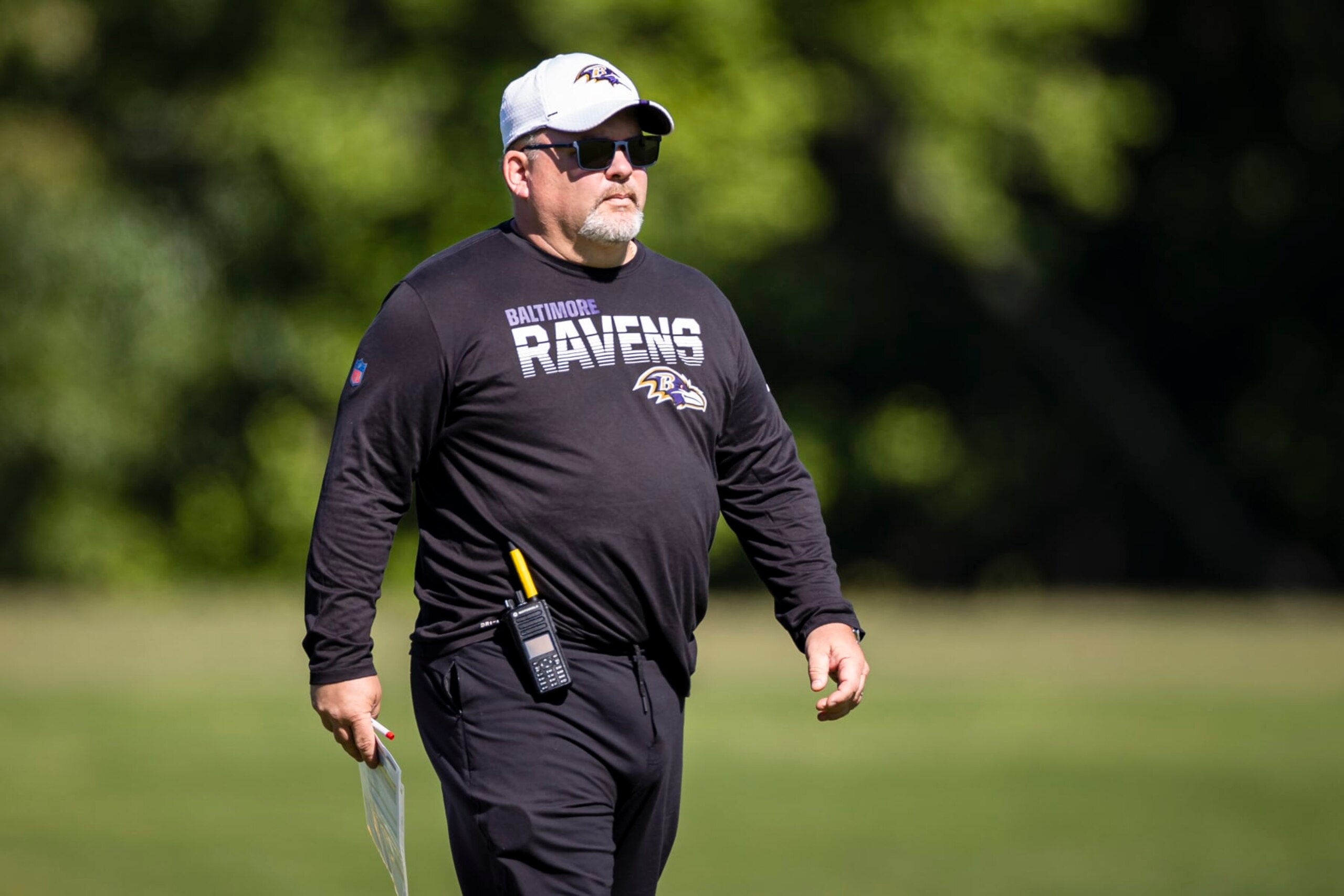 OWINGS MILLS, MD - JUNE 16: Offensive coordinator Greg Roman of the Baltimore Ravens looks on during mandatory minicamp at Under Armour Performance Center on June 16, 2021 in Owings Mills, Maryland. (Photo by Scott Taetsch/Getty Images)
