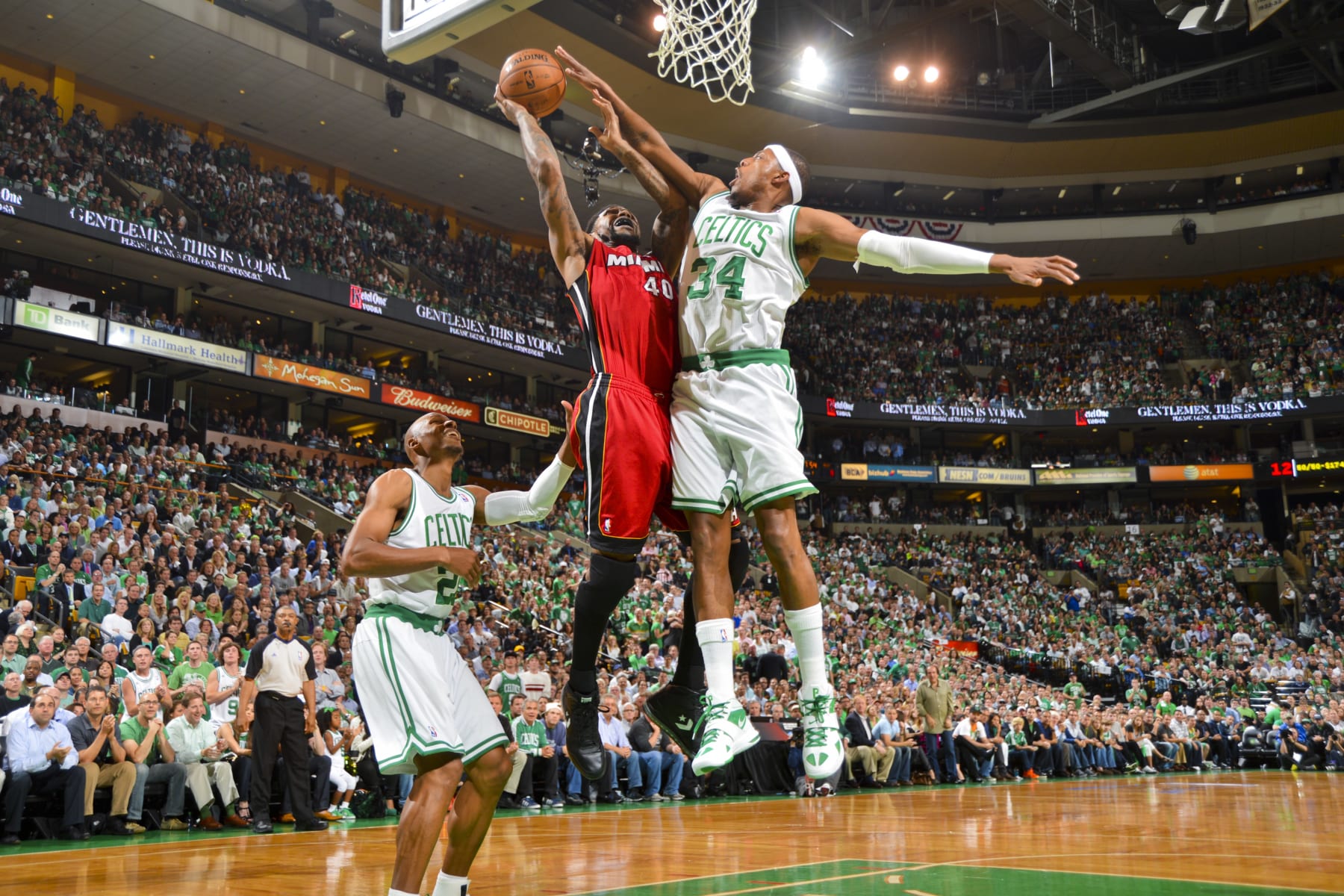 BOSTON, MA - JUNE 7: Udonis Haslem #40 of the Miami Heat attempts a shot against Paul Pierce #34 of the Boston Celtics in Game Six of the Eastern Conference Finals during the 2012 NBA Playoffs on June 7, 2012 at the TD Garden in Boston, Massachusetts.  NOTE TO USER: User expressly acknowledges and agrees that, by downloading and/or using this photograph, user is consenting to the terms and conditions of the Getty Images License Agreement. Mandatory Copyright Notice: Copyright 2012 NBAE (Photo by Jesse D. Garrabrant/NBAE via Getty Images)