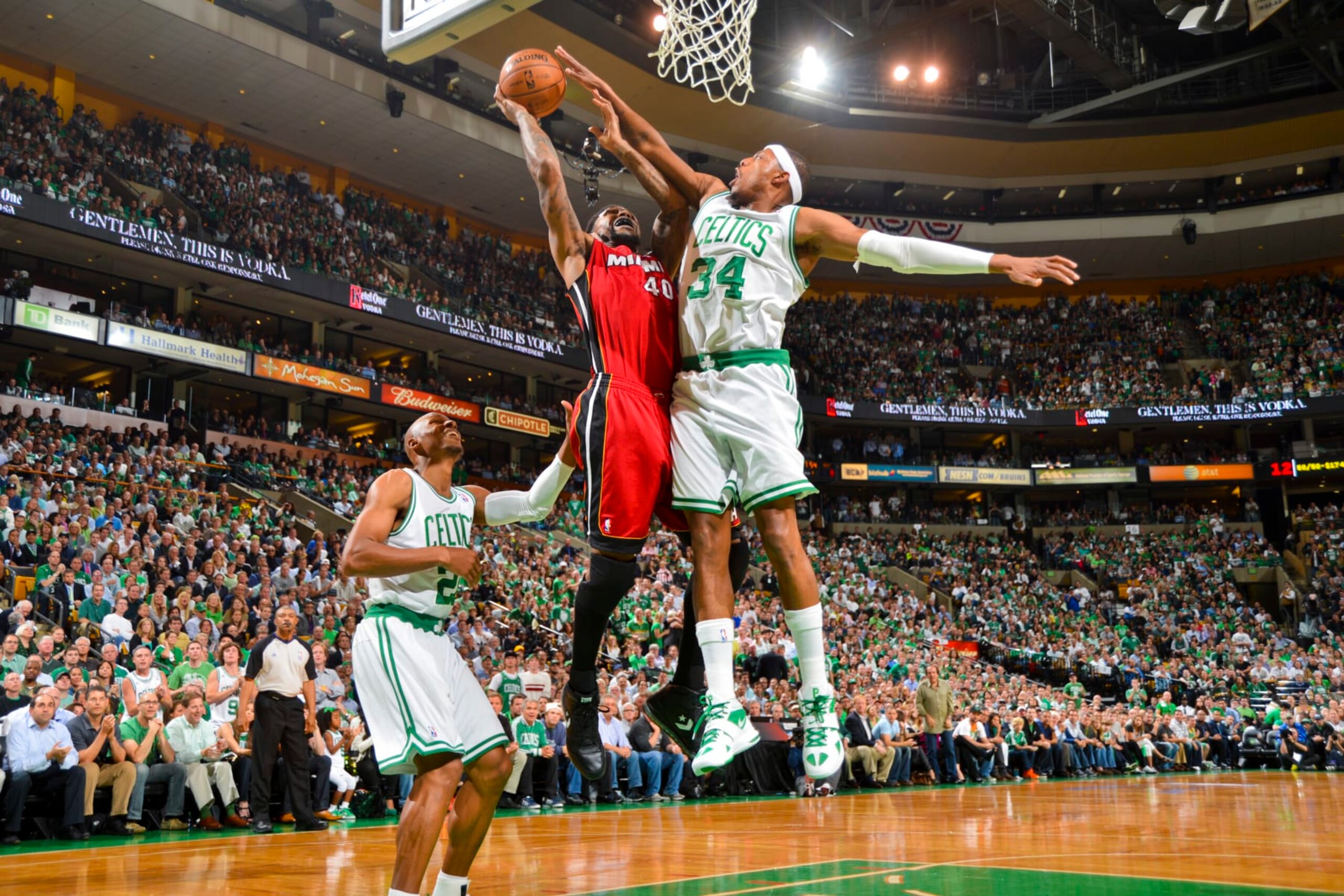 BOSTON, MA - JUNE 7: Udonis Haslem #40 of the Miami Heat attempts a shot against Paul Pierce #34 of the Boston Celtics in Game Six of the Eastern Conference Finals during the 2012 NBA Playoffs on June 7, 2012 at the TD Garden in Boston, Massachusetts. NOTE TO USER: User expressly acknowledges and agrees that, by downloading and/or using this photograph, user is consenting to the terms and conditions of the Getty Images License Agreement. Mandatory Copyright Notice: Copyright 2012 NBAE (Photo by Jesse D. Garrabrant/NBAE via Getty Images) BOSTON, MA - JUNE 7: Udonis Haslem #40 of the Miami Heat attempts a shot against Paul Pierce #34 of the Boston Celtics in Game Six of the Eastern Conference Finals during the 2012 NBA Playoffs on June 7, 2012 at the TD Garden in Boston, Massachusetts. NOTE TO USER: User expressly acknowledges and agrees that, by downloading and/or using this photograph, user is consenting to the terms and conditions of the Getty Images License Agreement. Mandatory Copyright Notice: Copyright 2012 NBAE (Photo by Jesse D. Garrabrant/NBAE via Getty Images)