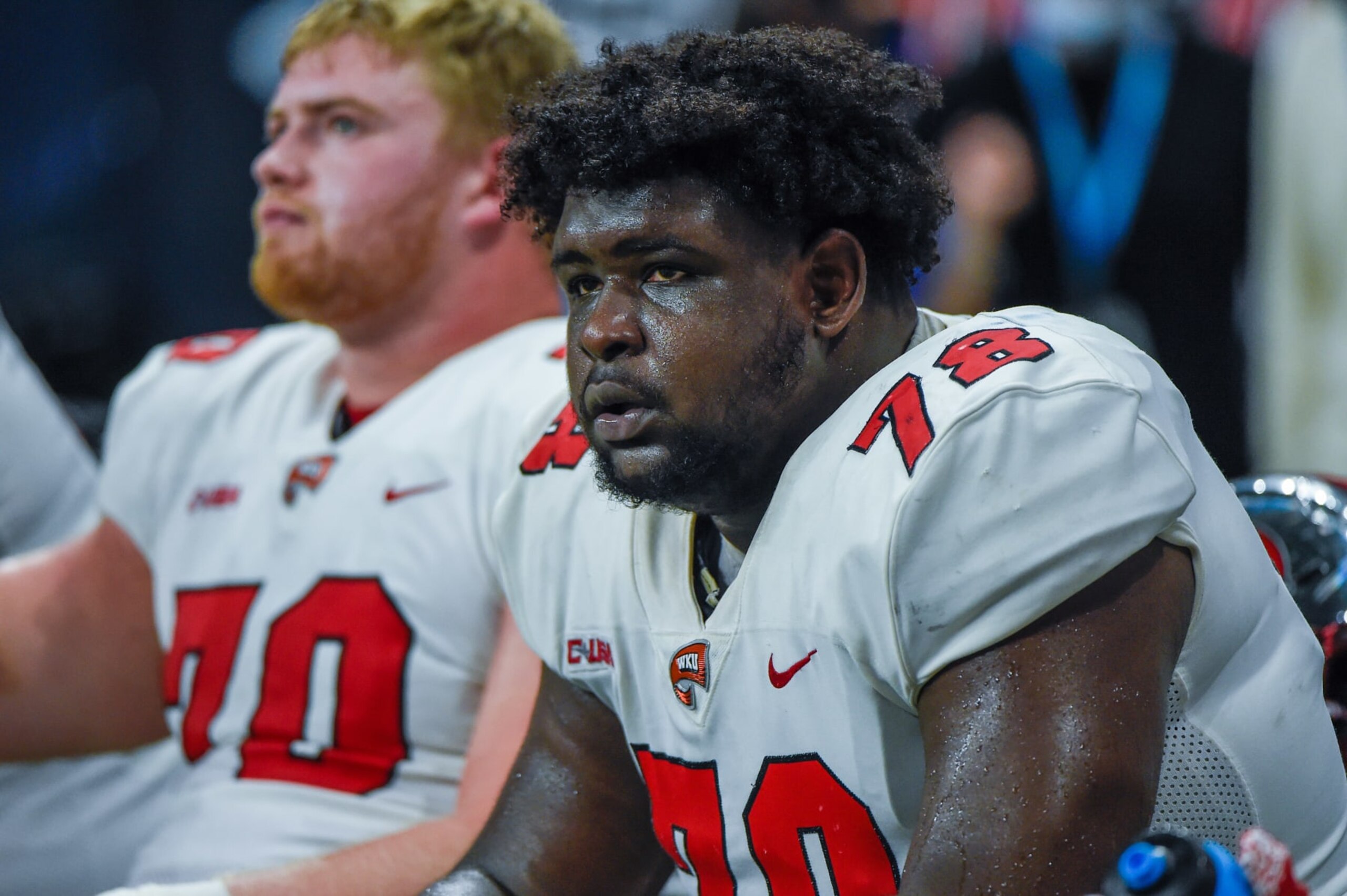 SAN ANTONIO, TX - DECEMBER 03: Western Kentucky Hilltoppers offensive lineman Quantavious Leslie (78) rests on the sideline during the football game between the Western Kentucky Hilltoppers and UTSA Roadrunners at the Alamodome on December 3, 2021 in San Antonio, Texas. (Photo by Ken Murray/Icon Sportswire via Getty Images)