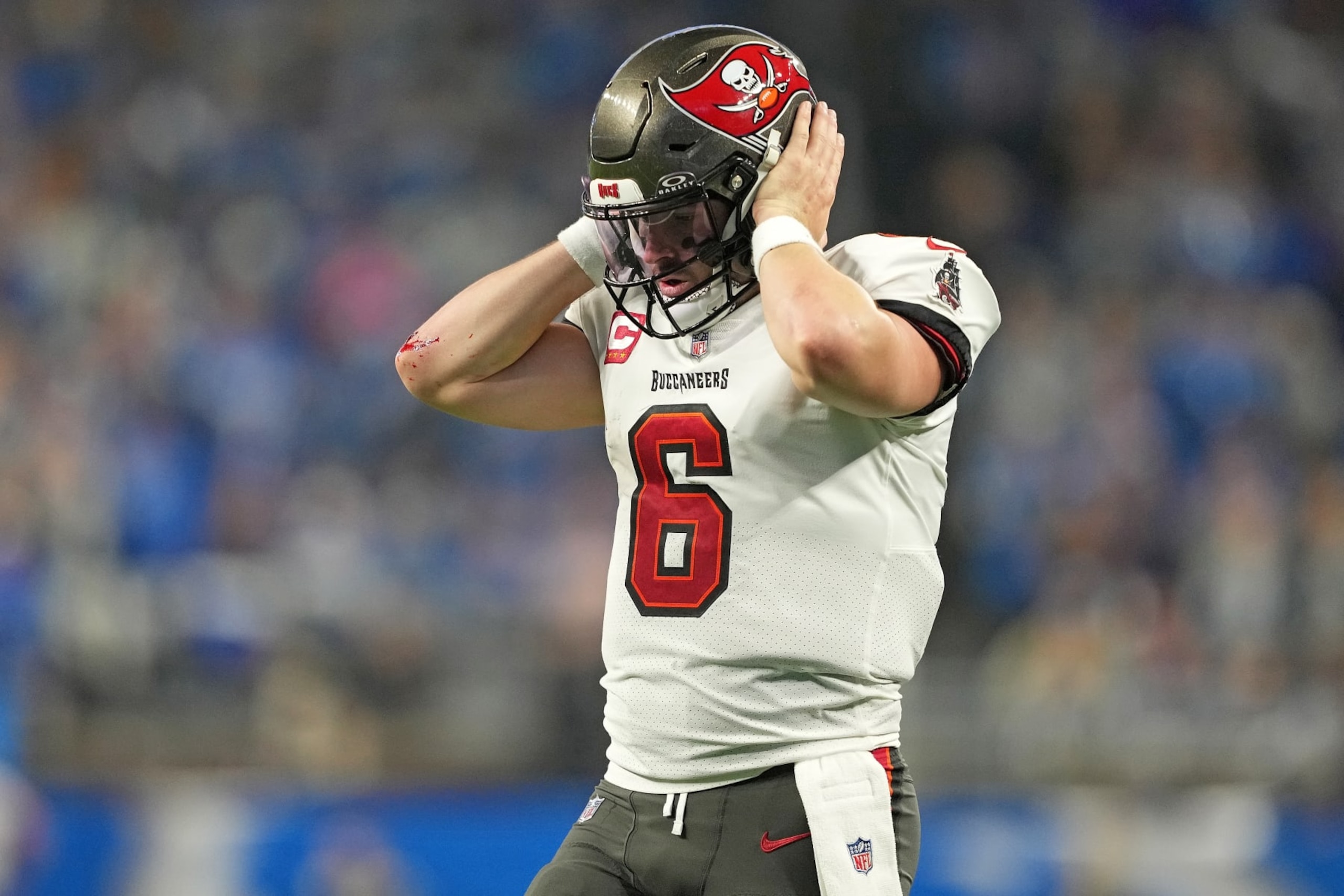 DETROIT, MICHIGAN - JANUARY 21: Baker Mayfield #6 of the Tampa Bay Buccaneers stands on the field during the second quarter of the NFC Divisional Playoff game against the Detroit Lions at Ford Field on January 21, 2024 in Detroit, Michigan. (Photo by Nic Antaya/Getty Images)
