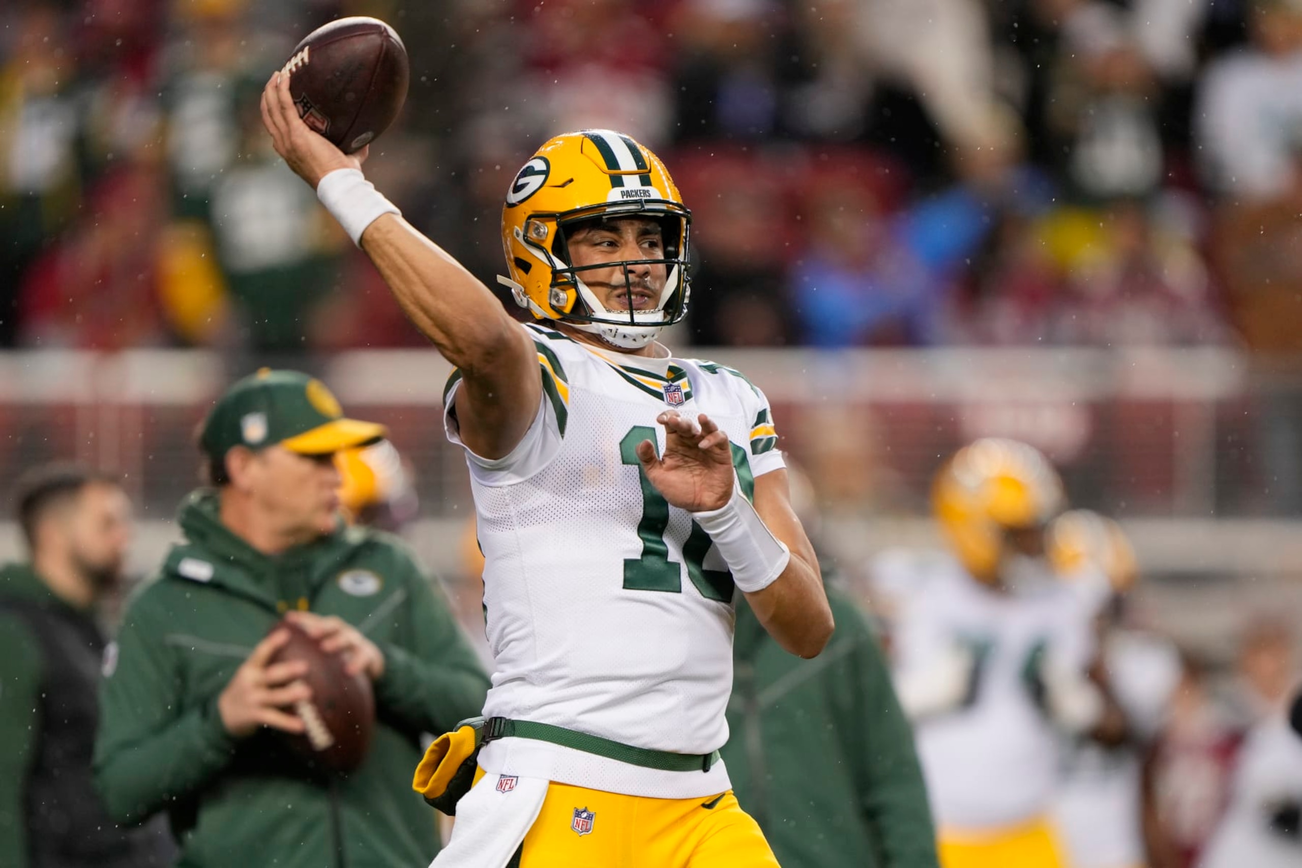 SANTA CLARA, CALIFORNIA - JANUARY 20: Jordan Love #10 of the Green Bay Packers warms up before the NFC Divisional Playoffs against the San Francisco 49ers at Levi's Stadium on January 20, 2024 in Santa Clara, California. (Photo by Thearon W. Henderson/Getty Images)