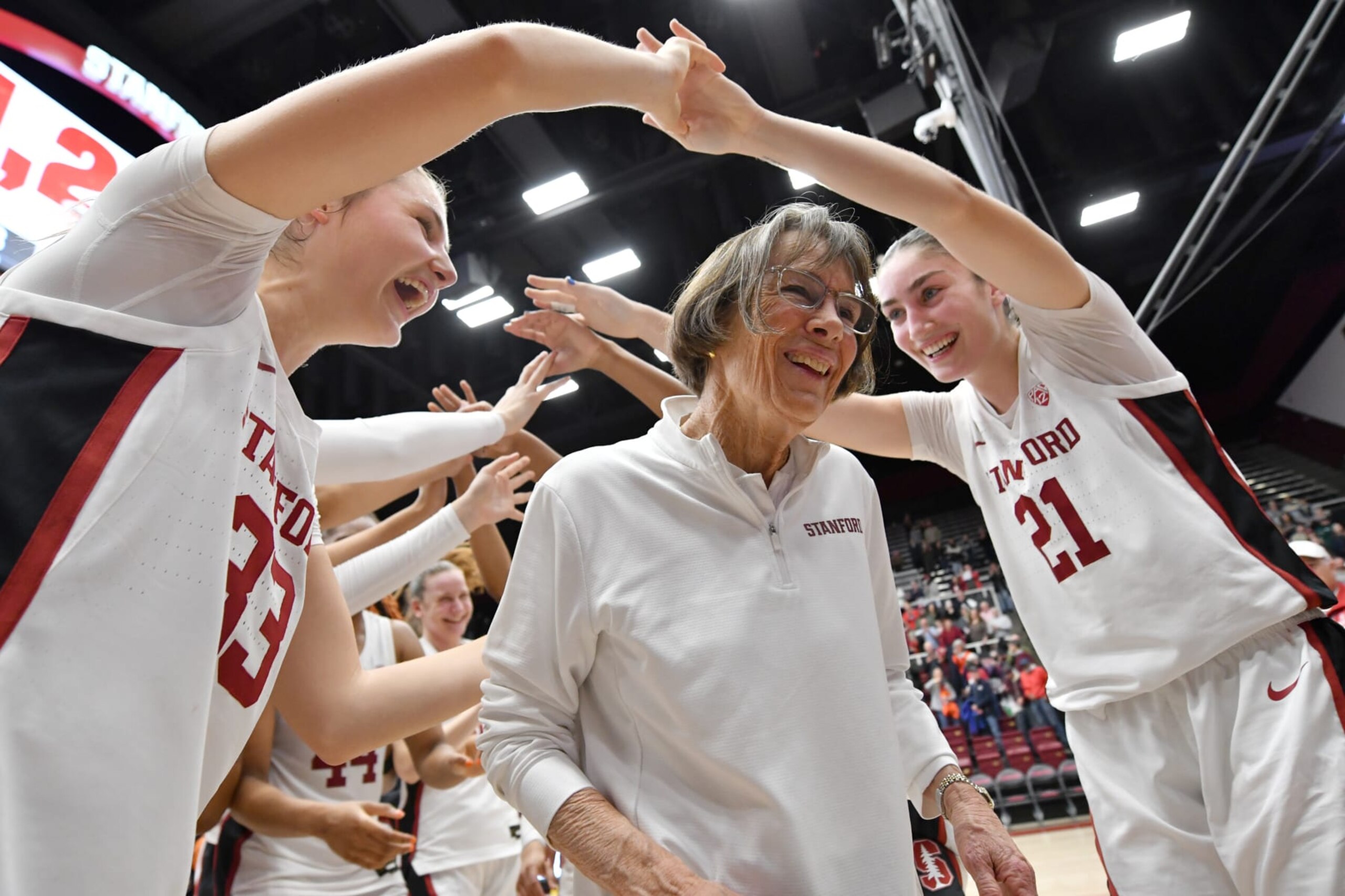 PALO ALTO, CALIFORNIA - JANUARY 19: Stanford Cardinal head coach Tara VanDerveer celebrates at Stanford Maples Pavilion after a game against the Oregon Ducks. Tara VanDerveer ties Mike Krzyzewski with 1,202 NCAA career wins at Stanford Maples Pavilion on January 19, 2024 in Palo Alto, California. (Photo by Brandon Vallance/Getty Images)