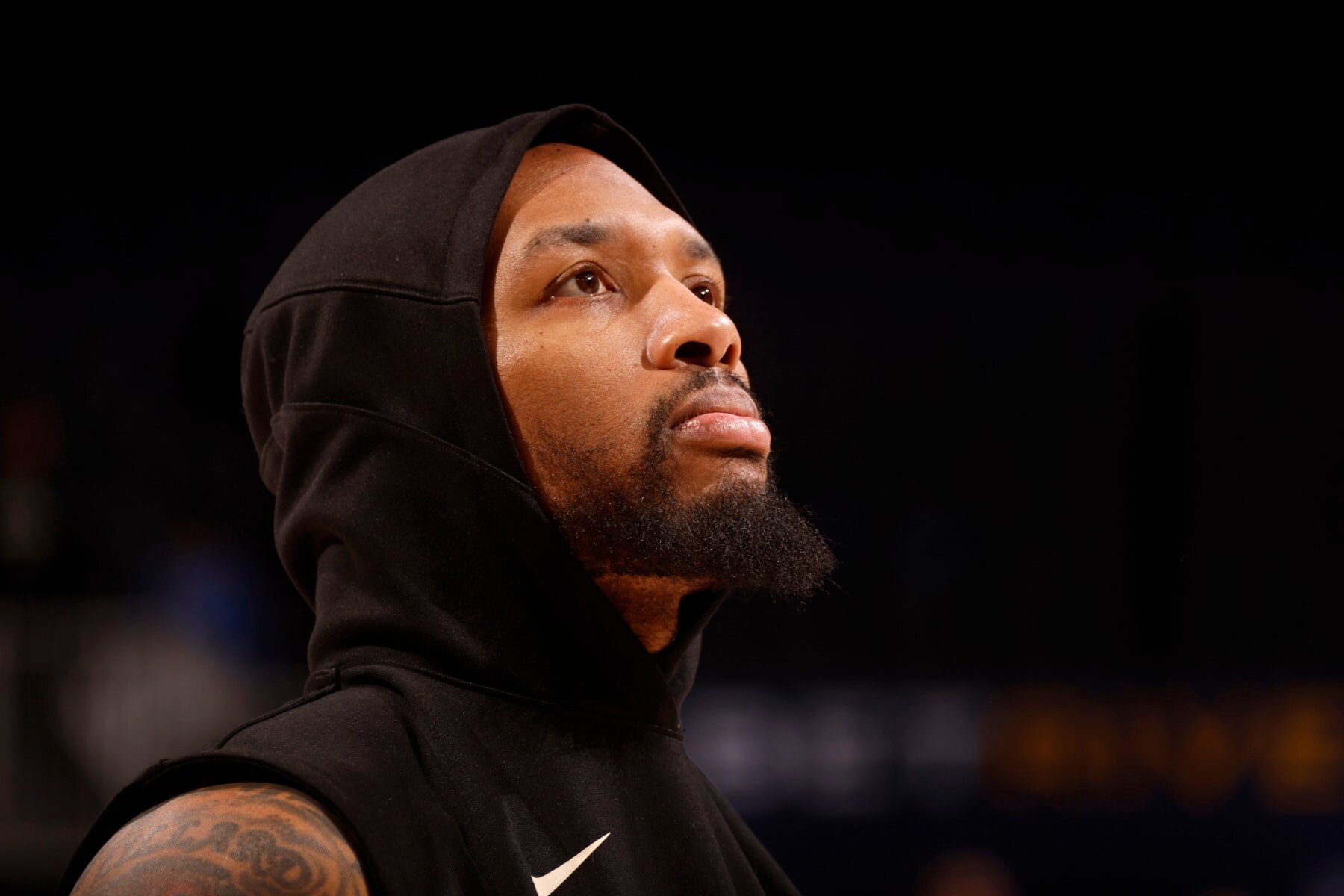 DETROIT, MI - JANUARY 20: Damian Lillard #0 of the Milwaukee Bucks looks on before the game against the Detroit Pistons on January 20, 2024 at Little Caesars Arena in Detroit, Michigan. NOTE TO USER: User expressly acknowledges and agrees that, by downloading and/or using this photograph, User is consenting to the terms and conditions of the Getty Images License Agreement. Mandatory Copyright Notice: Copyright 2024 NBAE (Photo by Brian Sevald/NBAE via Getty Images)