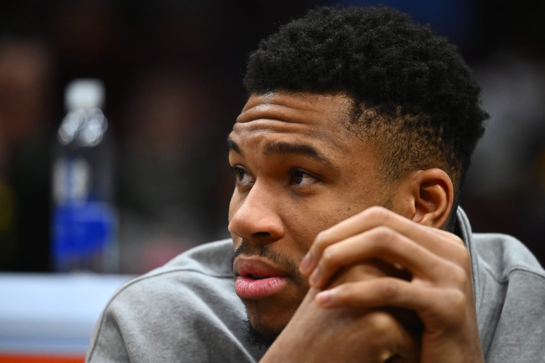 CLEVELAND, OHIO - JANUARY 17: Giannis Antetokounmpo of the Milwaukee Bucks watches from the bench during the fourth quarter against the Cleveland Cavaliers at Rocket Mortgage Fieldhouse on January 17, 2024 in Cleveland, Ohio. The Cavaliers defeated the Bucks 135-95. NOTE TO USER: User expressly acknowledges and agrees that, by downloading and or using this photograph, User is consenting to the terms and conditions of the Getty Images License Agreement. (Photo by Jason Miller/Getty Images)