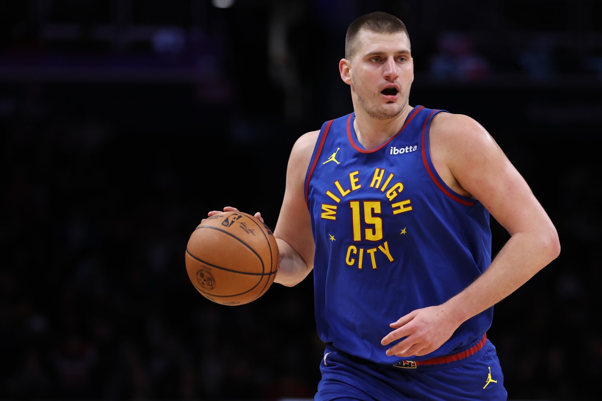 WASHINGTON, DC - JANUARY 21: Nikola Jokic #15 of the Denver Nuggets dribbles the ball up the court against the Washington Wizards during the first half at Capital One Arena on January 21, 2024 in Washington, DC. NOTE TO USER: User expressly acknowledges and agrees that, by downloading and or using this photograph, User is consenting to the terms and conditions of the Getty Images License Agreement. (Photo by Patrick Smith/Getty Images) WASHINGTON, DC - JANUARY 21: Nikola Jokic #15 of the Denver Nuggets dribbles the ball up the court against the Washington Wizards during the first half at Capital One Arena on January 21, 2024 in Washington, DC. NOTE TO USER: User expressly acknowledges and agrees that, by downloading and or using this photograph, User is consenting to the terms and conditions of the Getty Images License Agreement. (Photo by Patrick Smith/Getty Images)