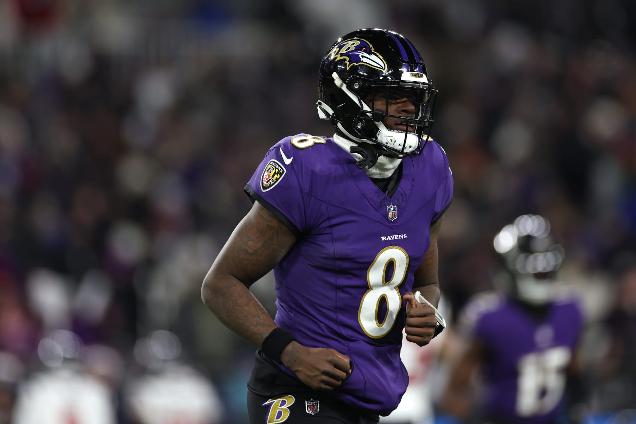 BALTIMORE, MARYLAND - JANUARY 20: Quarterback Lamar Jackson #8 of the Baltimore Ravens reacts against the Houston Texans during the second quarter in the AFC Divisional Playoff game at M&T Bank Stadium on January 20, 2024 in Baltimore, Maryland. (Photo by Patrick Smith/Getty Images)