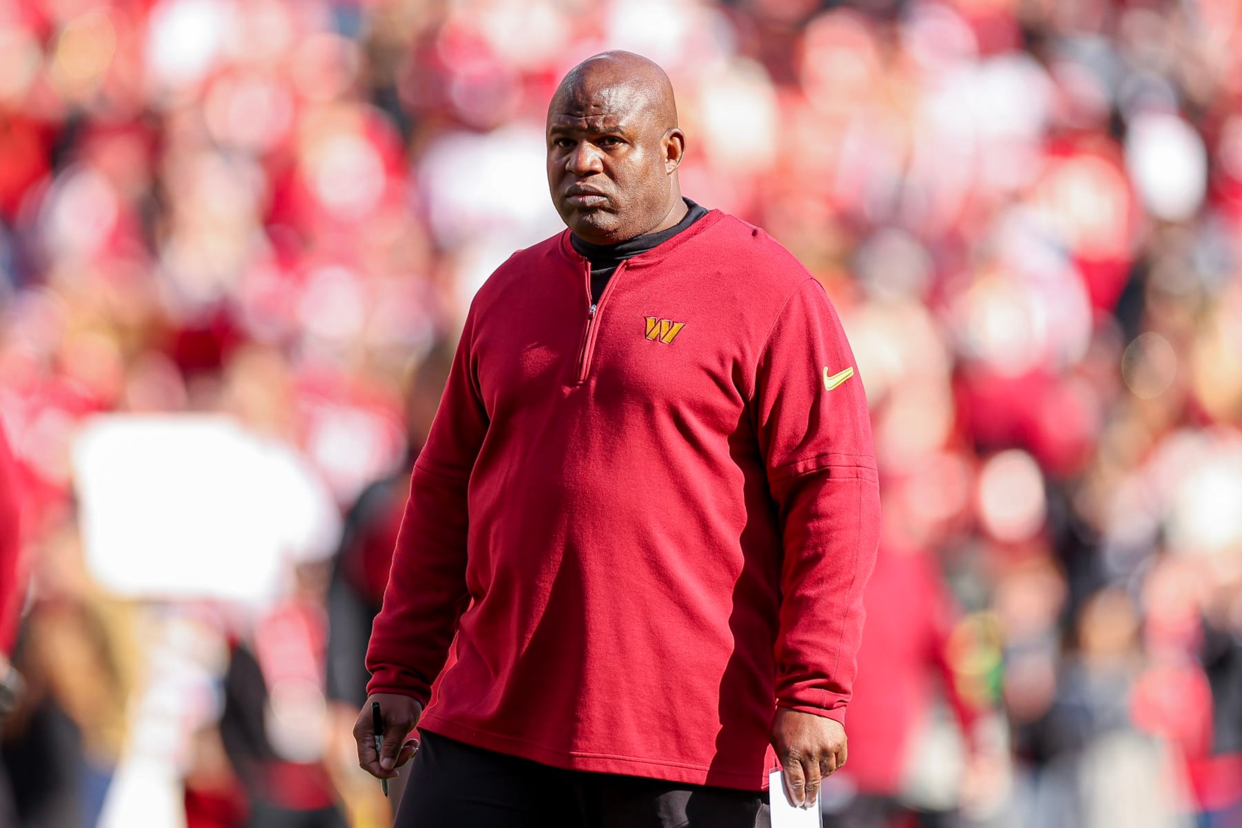 LANDOVER, MARYLAND - DECEMBER 31: Offensive coordinator Eric Bieniemy of the Washington Commanders looks on prior to a game against the San Francisco 49ers FedExField on December 31, 2023 in Landover, Maryland. (Photo by Scott Taetsch/Getty Images) LANDOVER, MARYLAND - DECEMBER 31: Offensive coordinator Eric Bieniemy of the Washington Commanders looks on prior to a game against the San Francisco 49ers FedExField on December 31, 2023 in Landover, Maryland. (Photo by Scott Taetsch/Getty Images)