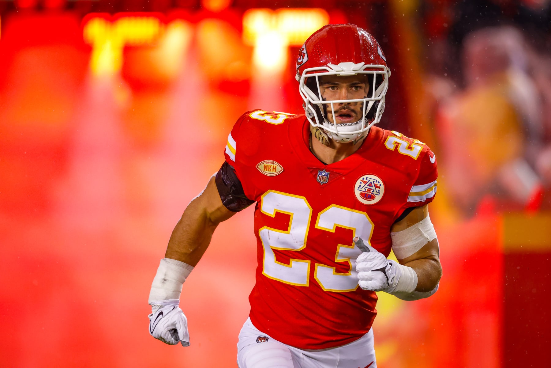 KANSAS CITY, MISSOURI - NOVEMBER 20: Drue Tranquill #23 of the Kansas City Chiefs runs on the field during pregame introductions prior to the game against the Philadelphia Eagles at GEHA Field at Arrowhead Stadium on November 20, 2023 in Kansas City, Missouri. (Photo by David Eulitt/Getty Images)