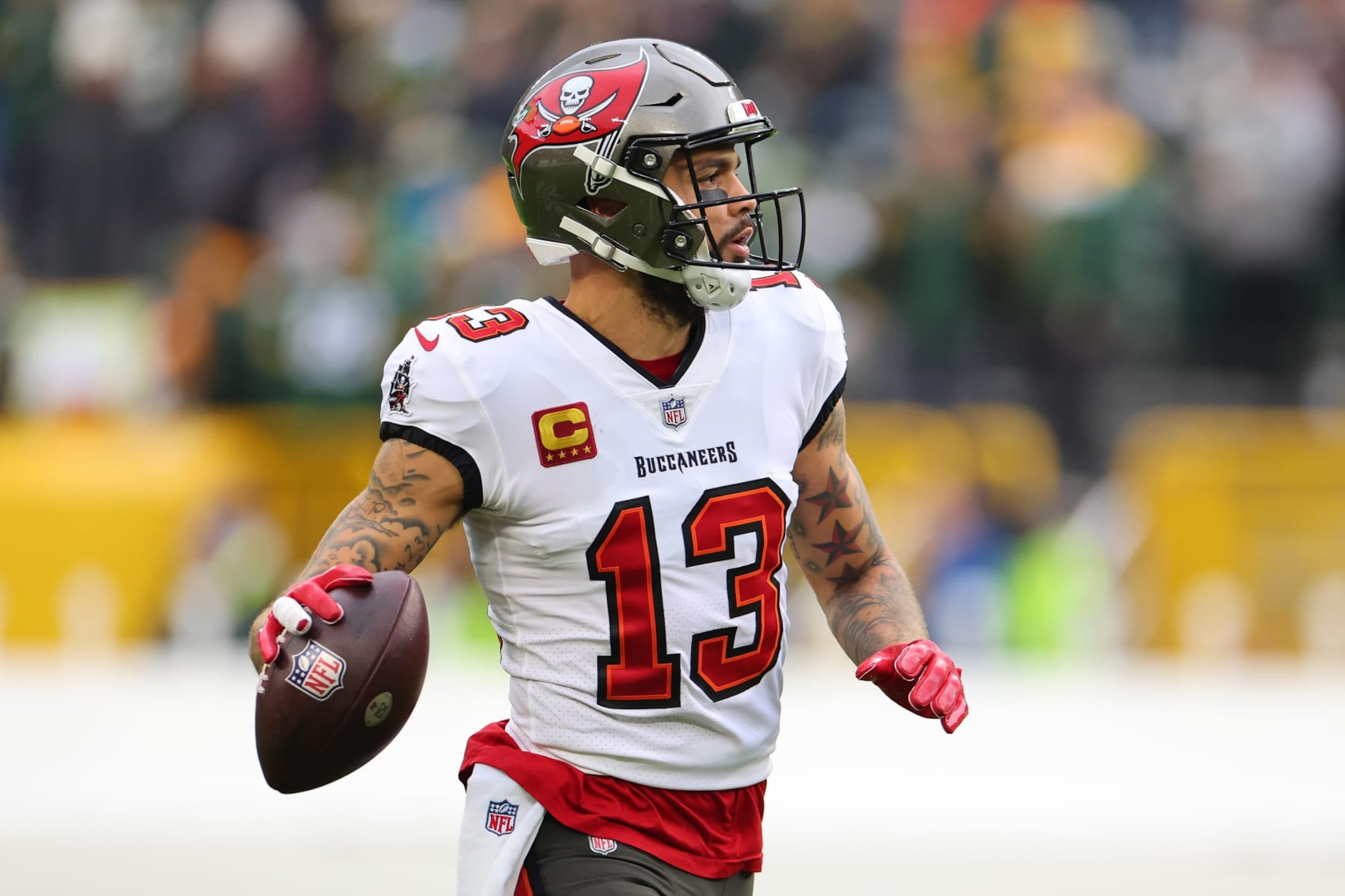 GREEN BAY, WISCONSIN - DECEMBER 17: Mike Evans #13 of the Tampa Bay Buccaneers participates in warmups prior to a game against the Green Bay Packers at Lambeau Field on December 17, 2023 in Green Bay, Wisconsin.  The Buccaneers defeated the Packers 34-20.   (Photo by Stacy Revere/Getty Images)