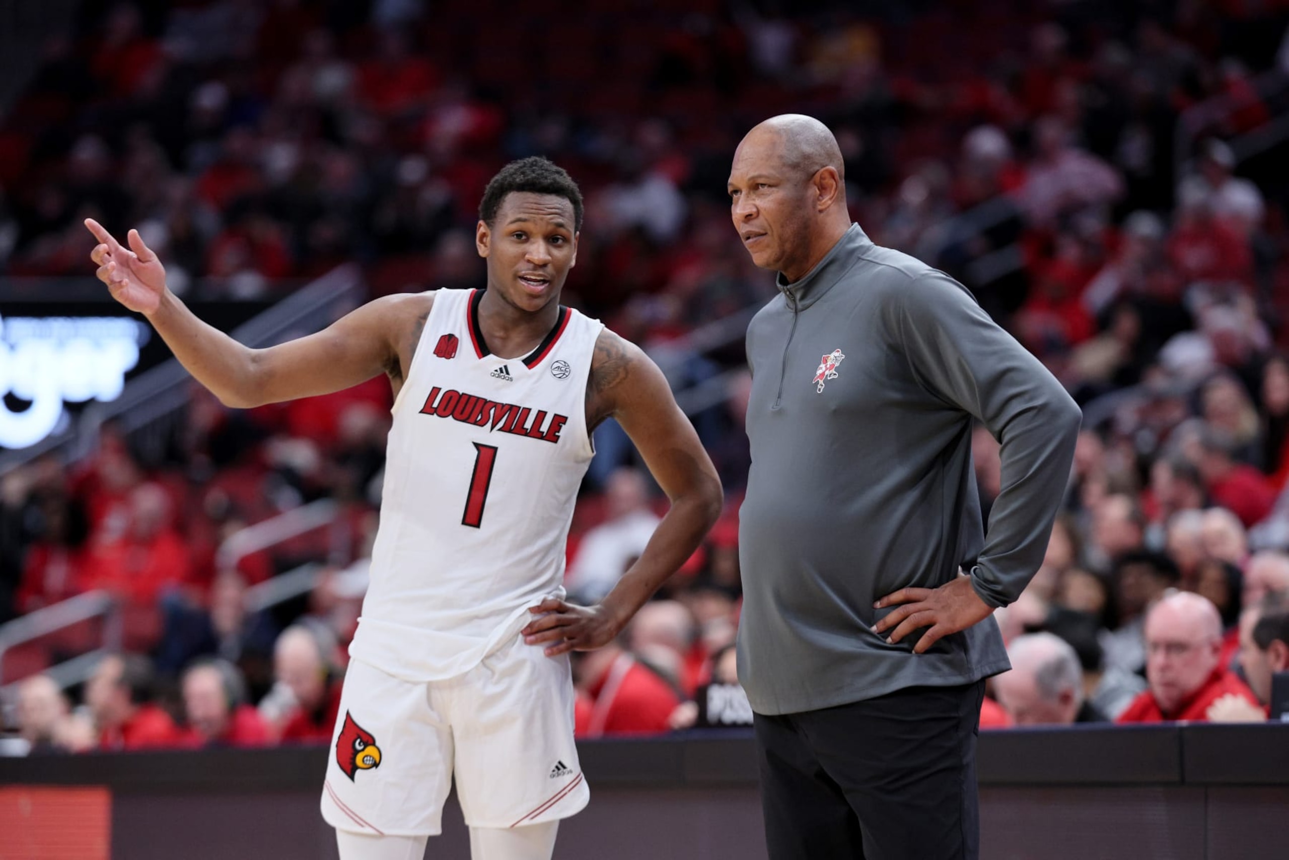 Louisville's Curtis Williams and head coach Kenny Payne