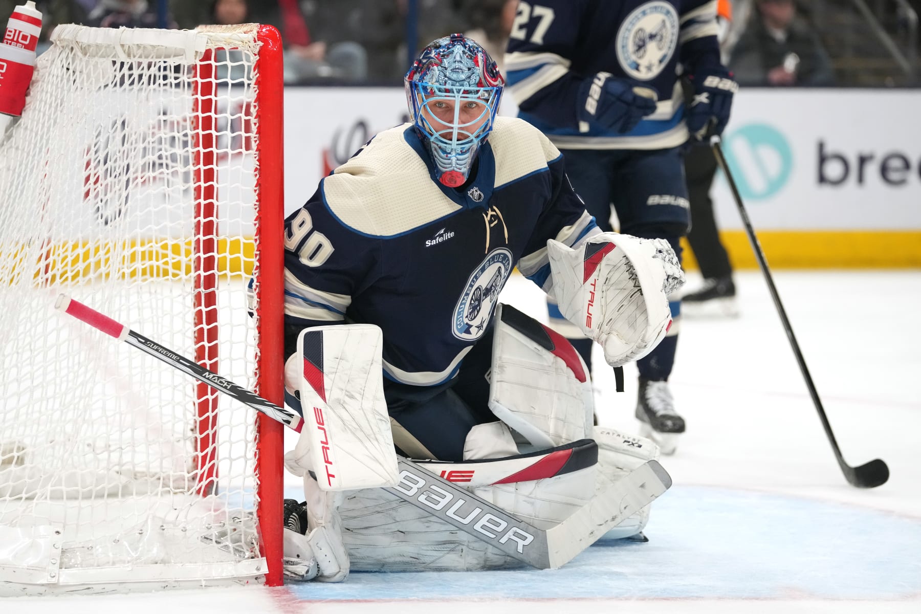 COLUMBUS, OHIO - JANUARY 19: Elvis Merzlikins #90 of the Columbus Blue Jackets tends net during the first period against the New Jersey Devils at Nationwide Arena on January 19, 2024 in Columbus, Ohio. (Photo by Jason Mowry/Getty Images)