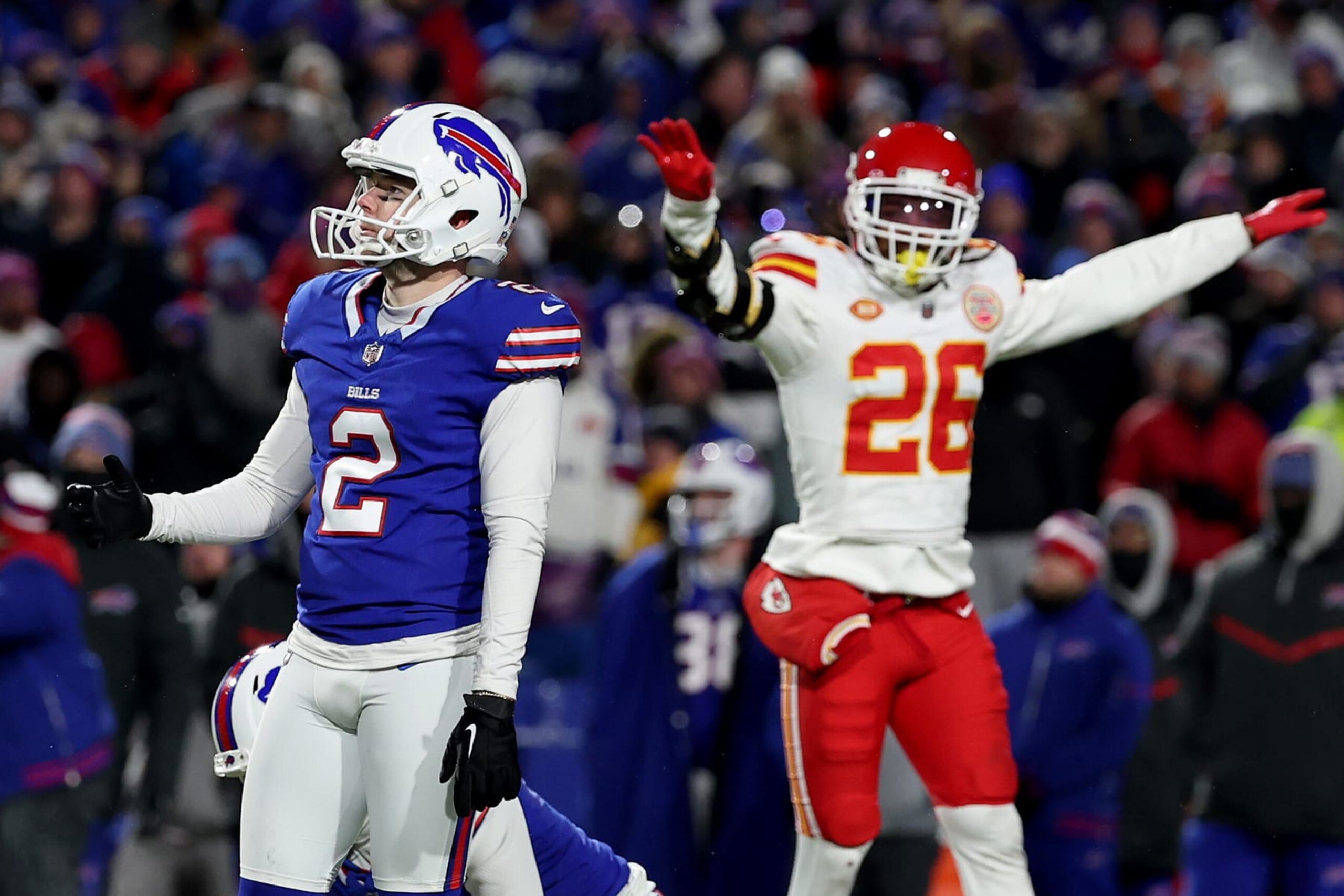 ORCHARD PARK, NEW YORK - JANUARY 21: Tyler Bass #2 of the Buffalo Bills reacts after missing a 44 yard field goal attempt against the Kansas City Chiefs during the fourth quarter in the AFC Divisional Playoff game at Highmark Stadium on January 21, 2024 in Orchard Park, New York. (Photo by Al Bello/Getty Images) ORCHARD PARK, NEW YORK - JANUARY 21: Tyler Bass #2 of the Buffalo Bills reacts after missing a 44 yard field goal attempt against the Kansas City Chiefs during the fourth quarter in the AFC Divisional Playoff game at Highmark Stadium on January 21, 2024 in Orchard Park, New York. (Photo by Al Bello/Getty Images)