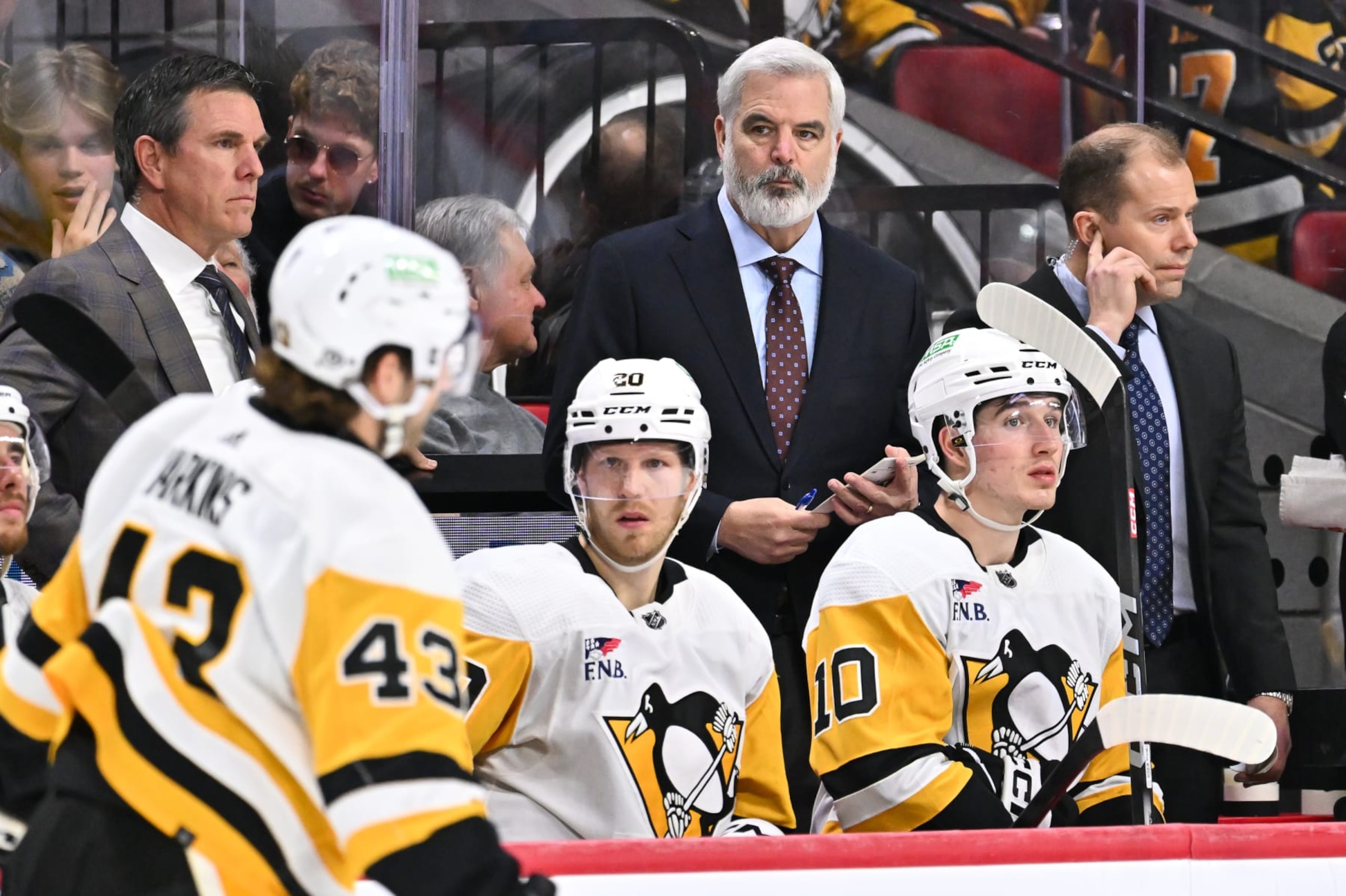 OTTAWA, CANADA - DECEMBER 23:  Assistant coach, Mike Vellucci of the Pittsburgh Penguins handles bench duties during the second period against the Ottawa Senators at Canadian Tire Centre on December 23, 2023 in Ottawa, Ontario, Canada.  The Ottawa Senators defeated the Pittsburgh Penguins 5-4 in overtime.  (Photo by Minas Panagiotakis/Getty Images)