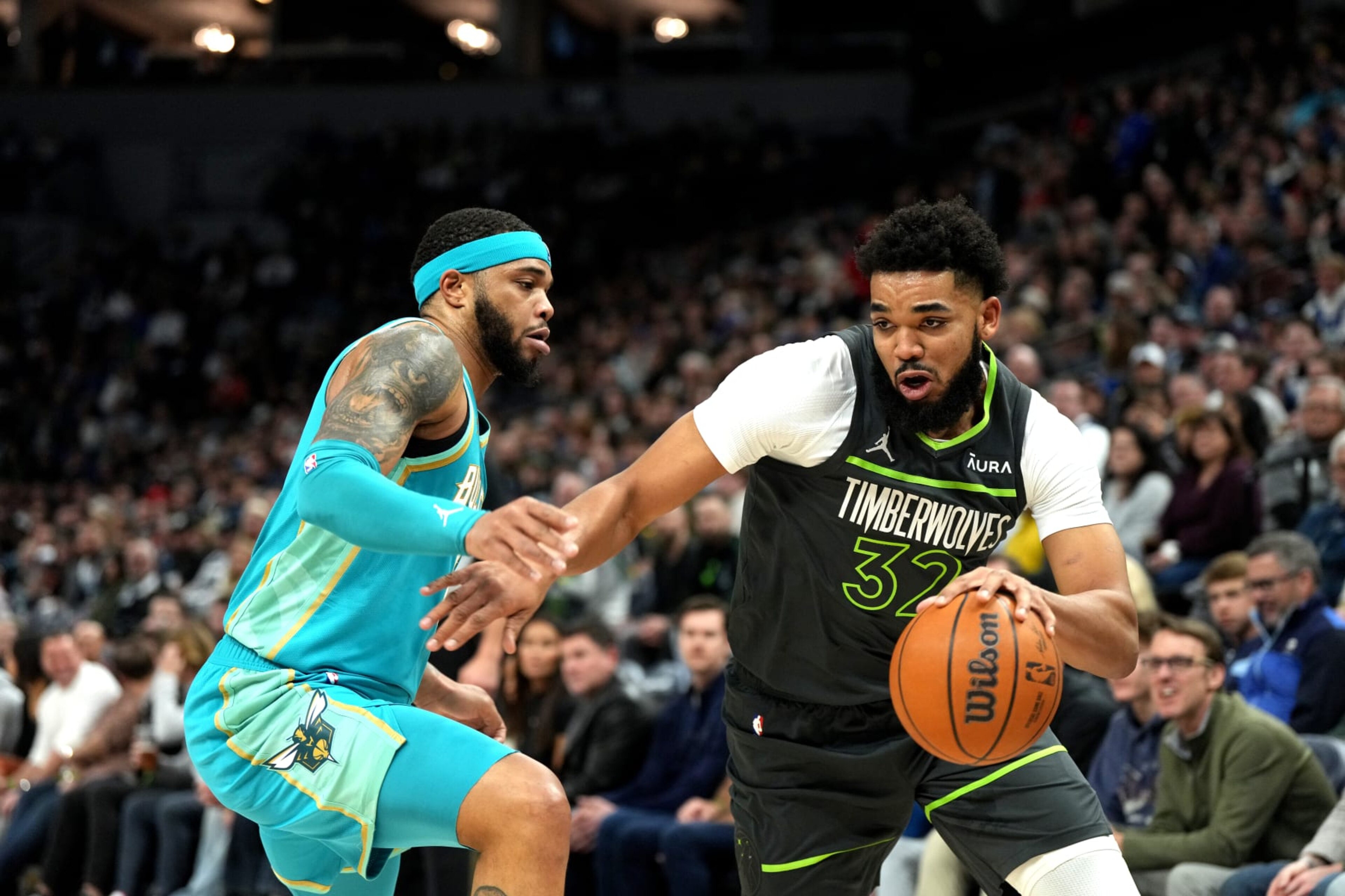MINNEAPOLIS, MN - JANUARY 22: Karl-Anthony Towns #32 of the Minnesota Timberwolves drives to the basket during the game against the Charlotte Hornets on January 22, 2024 at Target Center in Minneapolis, Minnesota. NOTE TO USER: User expressly acknowledges and agrees that, by downloading and or using this Photograph, user is consenting to the terms and conditions of the Getty Images License Agreement. Mandatory Copyright Notice: Copyright 2024 NBAE (Photo by Jordan Johnson/NBAE via Getty Images) MINNEAPOLIS, MN - JANUARY 22: Karl-Anthony Towns #32 of the Minnesota Timberwolves drives to the basket during the game against the Charlotte Hornets on January 22, 2024 at Target Center in Minneapolis, Minnesota. NOTE TO USER: User expressly acknowledges and agrees that, by downloading and or using this Photograph, user is consenting to the terms and conditions of the Getty Images License Agreement. Mandatory Copyright Notice: Copyright 2024 NBAE (Photo by Jordan Johnson/NBAE via Getty Images)
