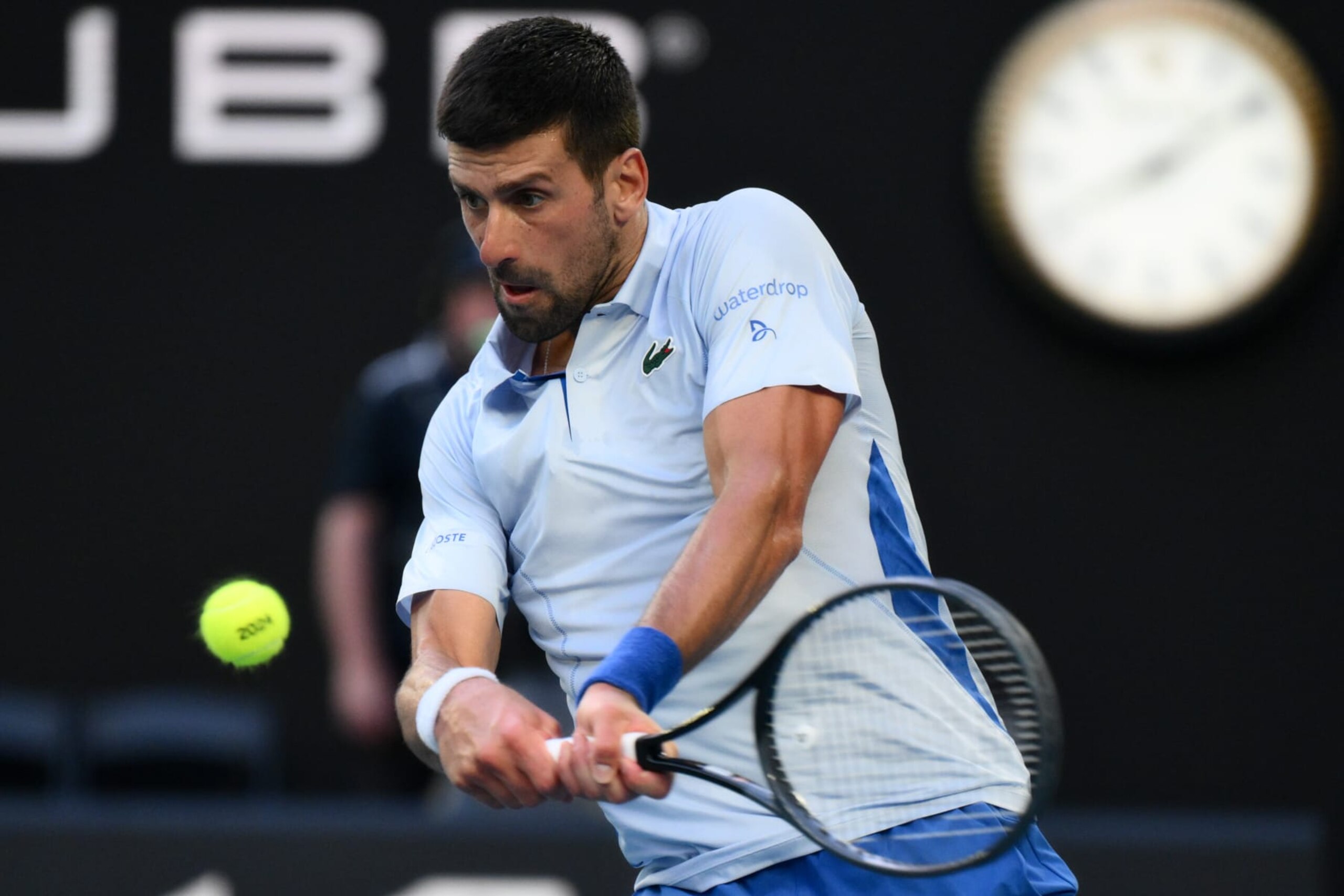 MELBOURNE, AUSTRALIA - JANUARY 23: Novak Djokovic of Serbia in action against Taylor Fritz of US (not seen) during the Quarter Final match at the Australian Open grand slam tennis tournament at Melbourne Park in Melbourne, Australia on January 23, 2024. (Photo by Stringer/Anadolu via Getty Images)