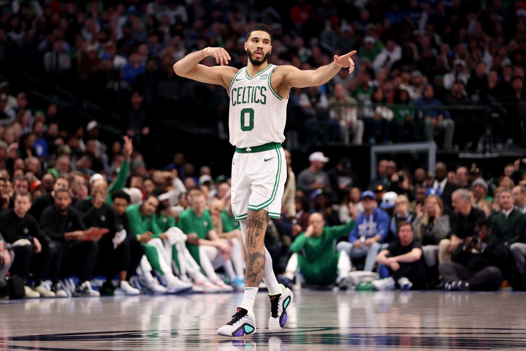 DALLAS, TEXAS - JANUARY 22: Jayson Tatum #0 of the Boston Celtics reacts after making a three-point basket against the Dallas Mavericks in the second half at American Airlines Center on January 22, 2024 in Dallas, Texas. NOTE TO USER: User expressly acknowledges and agrees that, by downloading and or using this photograph, User is consenting to the terms and conditions of the Getty Images License Agreement. (Photo by Tim Heitman/Getty Images)