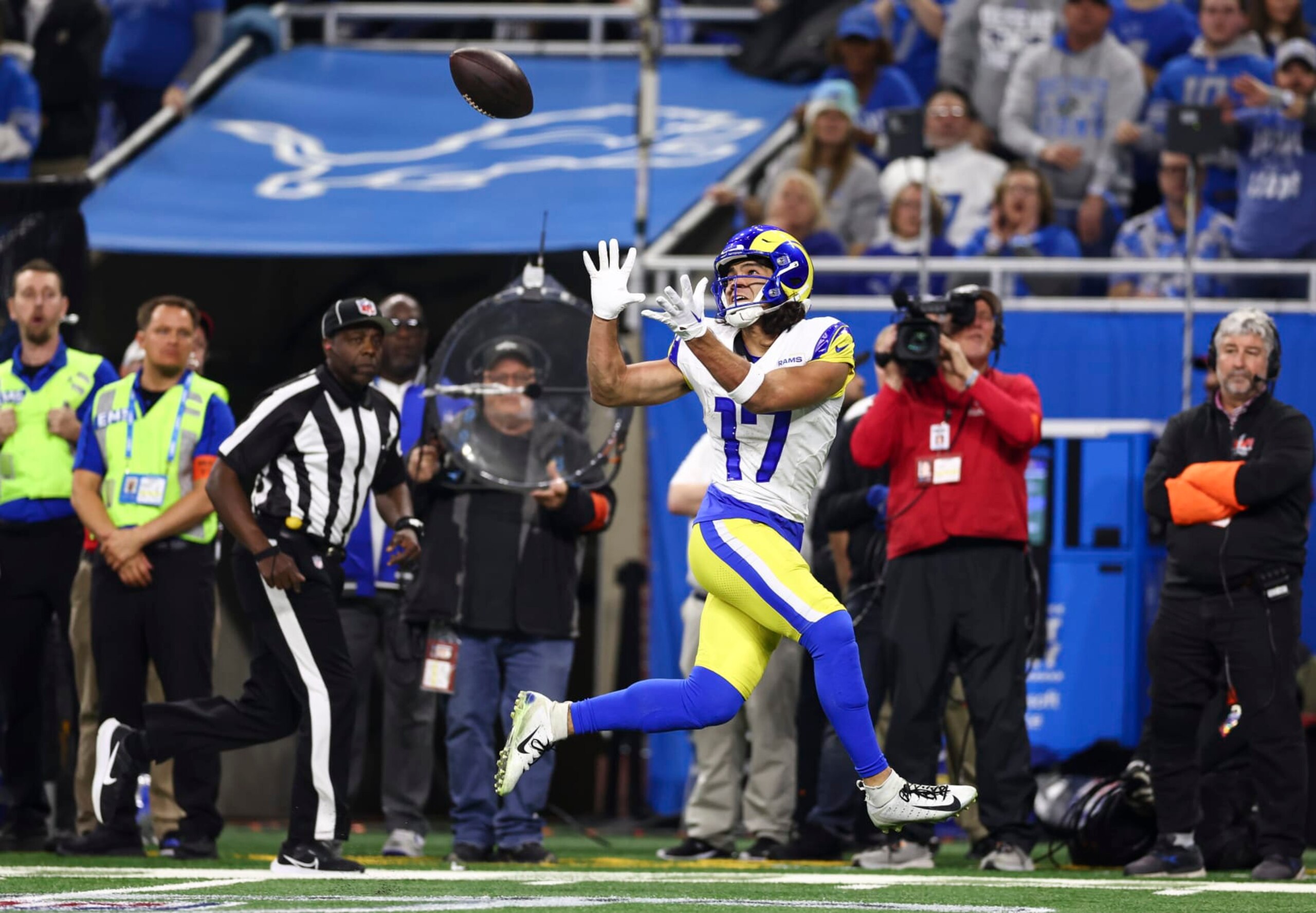 DETROIT, MI - JANUARY 14: Puka Nacua #17 of the Los Angeles Rams catches a pass for a touchdown during the second quarter of an NFL wild-card playoff football game against the Detroit Lions at Ford Field on January 14, 2024 in Detroit, Michigan. (Photo by Kevin Sabitus/Getty Images) DETROIT, MI - JANUARY 14: Puka Nacua #17 of the Los Angeles Rams catches a pass for a touchdown during the second quarter of an NFL wild-card playoff football game against the Detroit Lions at Ford Field on January 14, 2024 in Detroit, Michigan. (Photo by Kevin Sabitus/Getty Images)