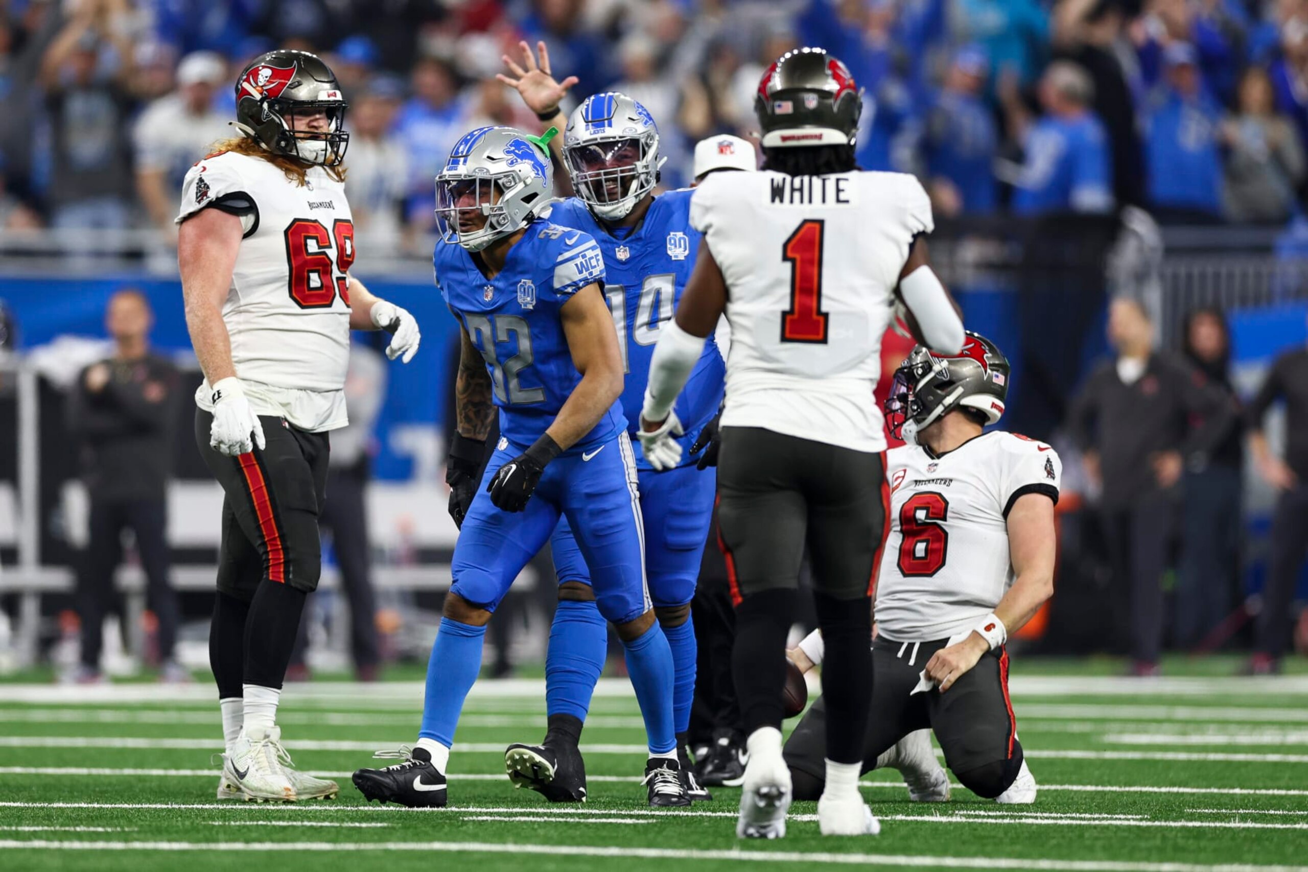 DETROIT, MI - JANUARY 21: Brian Branch #32 of the Detroit Lions celebrates after a play during an NFL divisional round playoff football game against the Tampa Bay Buccaneers at Ford Field on January 21, 2024 in Detroit, Michigan. (Photo by Kevin Sabitus/Getty Images) DETROIT, MI - JANUARY 21: Brian Branch #32 of the Detroit Lions celebrates after a play during an NFL divisional round playoff football game against the Tampa Bay Buccaneers at Ford Field on January 21, 2024 in Detroit, Michigan. (Photo by Kevin Sabitus/Getty Images)