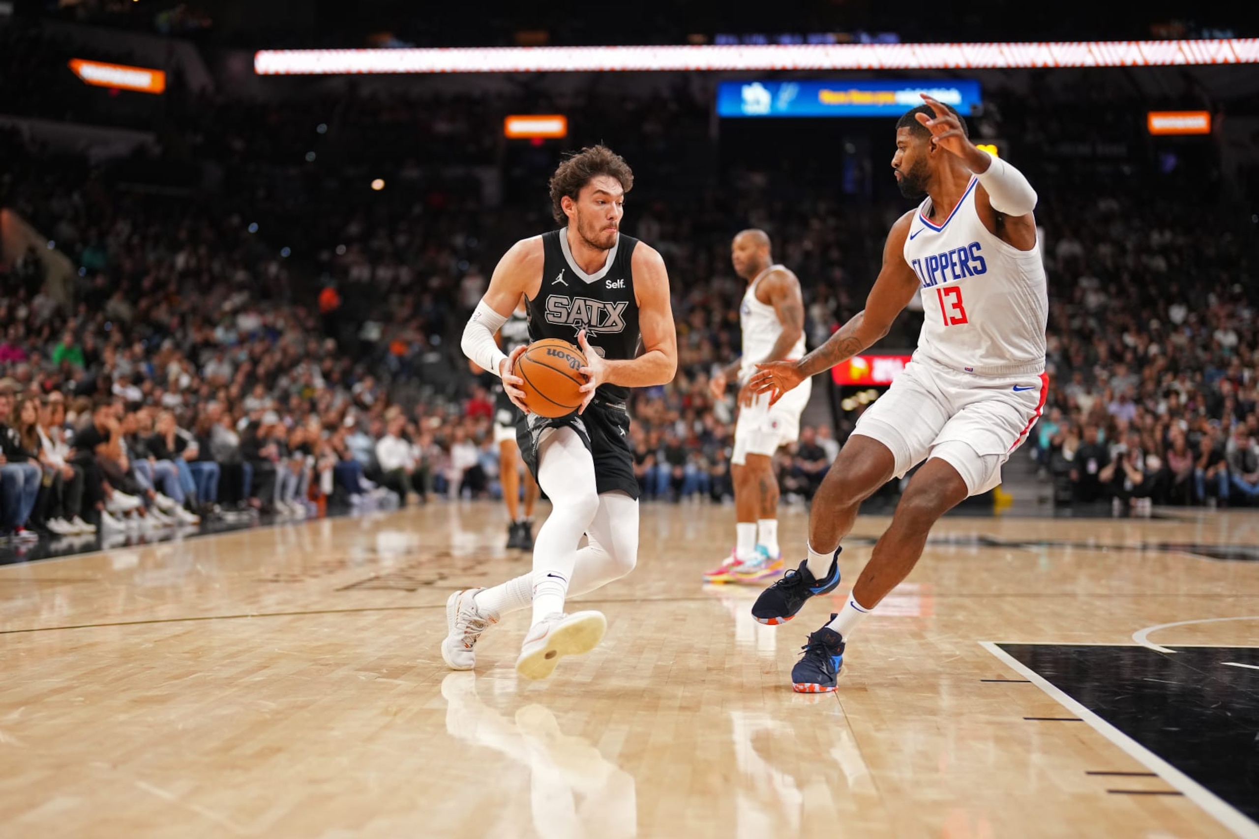 SAN ANTONIO, TX - NOVEMBER 22: Cedi Osman #16 of the San Antonio Spurs drives to the basket during the game against the LA Clippers on November 22, 2023 at the Frost Bank Center in San Antonio, Texas. NOTE TO USER: User expressly acknowledges and agrees that, by downloading and or using this photograph, user is consenting to the terms and conditions of the Getty Images License Agreement. Mandatory Copyright Notice: Copyright 2023 NBAE (Photos by Darren Carroll/NBAE via Getty Images)