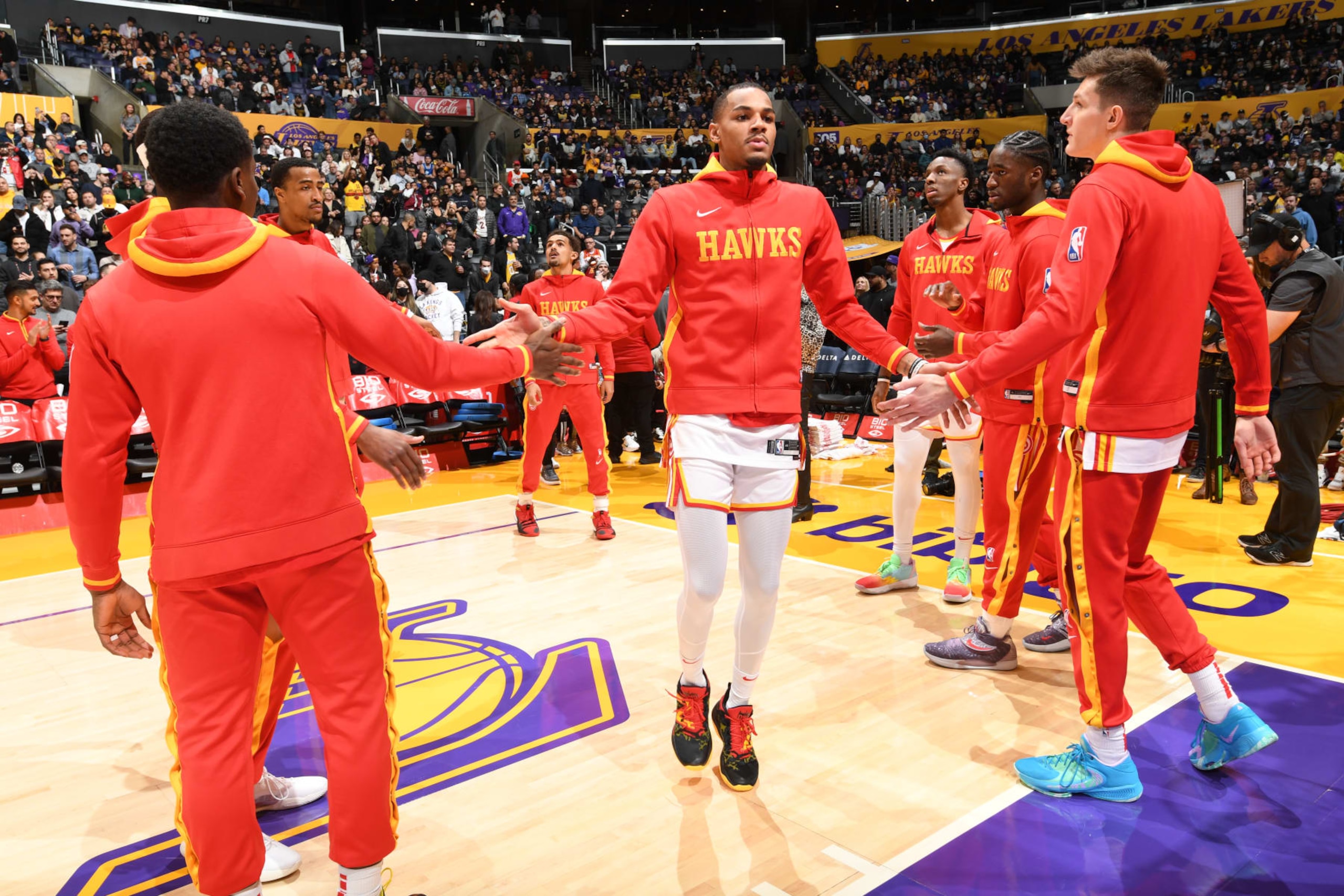 LOS ANGELES, CA - JANUARY 6: Dejounte Murray #5 of the Atlanta Hawks runs out before the game against the Los Angeles Lakers on January 6, 2023 at Crypto.Com Arena in Los Angeles, California. NOTE TO USER: User expressly acknowledges and agrees that, by downloading and/or using this Photograph, user is consenting to the terms and conditions of the Getty Images License Agreement. Mandatory Copyright Notice: Copyright 2023 NBAE (Photo by Andrew D. Bernstein/NBAE via Getty Images)