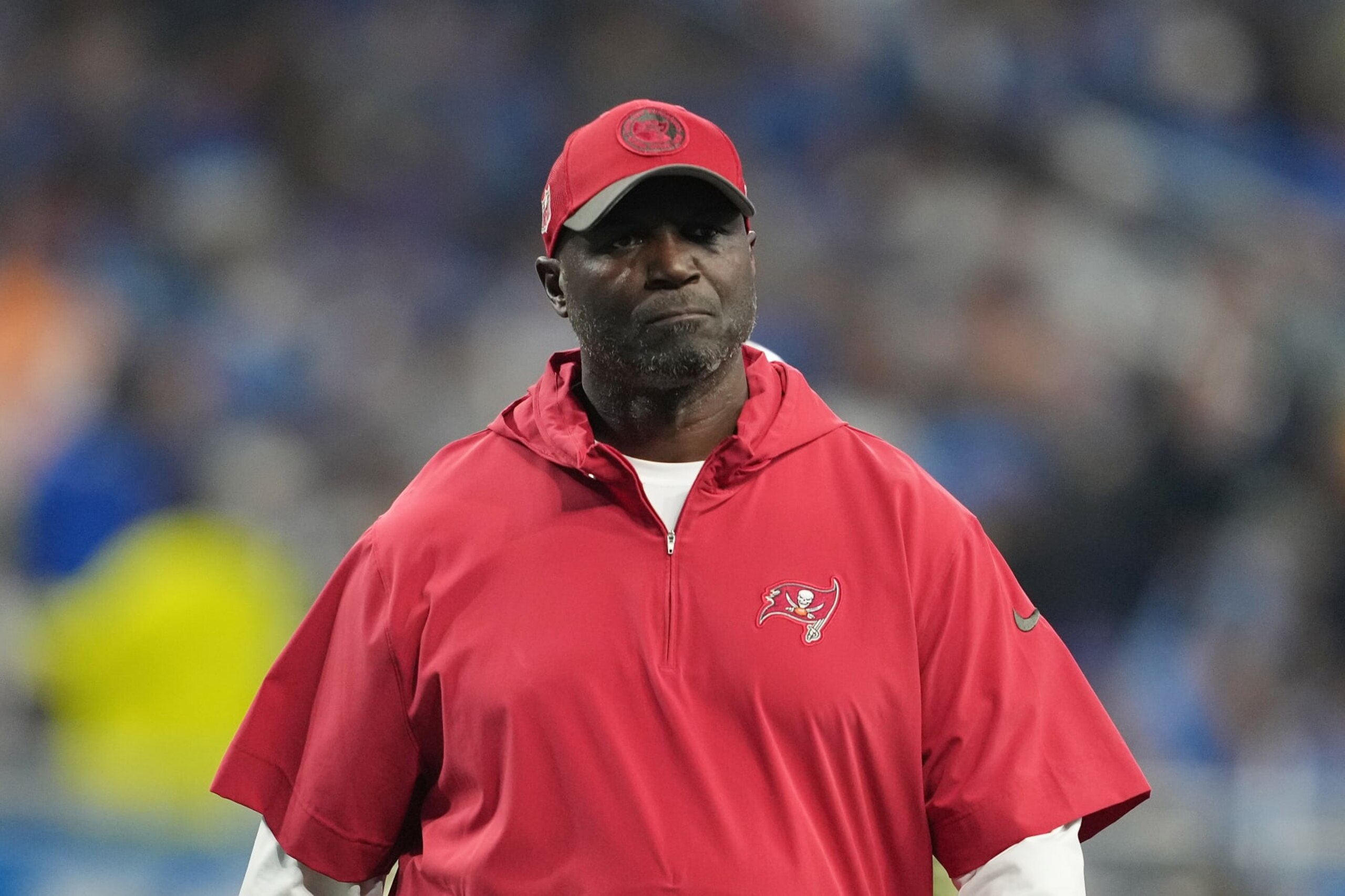 DETROIT, MICHIGAN - JANUARY 21: Head coach Todd Bowles of the Tampa Bay Buccaneers leaves the field for halftime during the NFC Divisional Playoff game against the Detroit Lions at Ford Field on January 21, 2024 in Detroit, Michigan. (Photo by Nic Antaya/Getty Images)