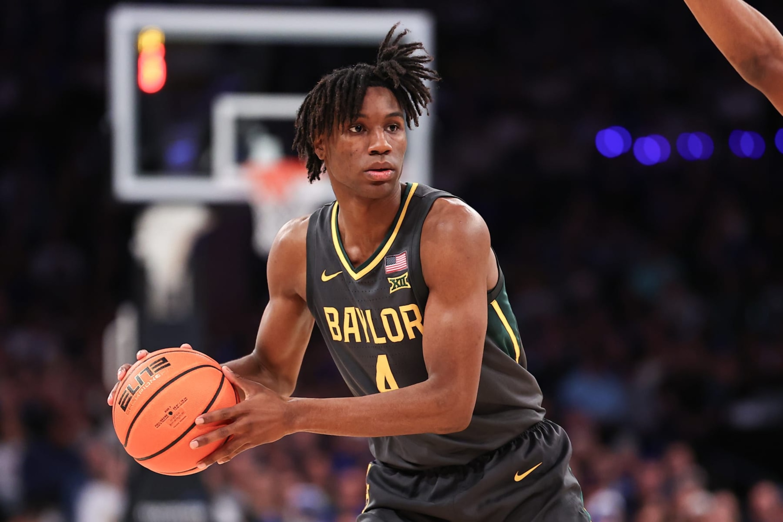 NEW YORK, NY - DECEMBER 20:  Ja'Kobe Walter #4 of the Baylor Bears controls the ball during the first half of the Garden Classic against the Duke Blue Devils on December 20, 2023 at Madison Square Garden in New York, New York.  (Photo by Rich Graessle/Icon Sportswire via Getty Images)