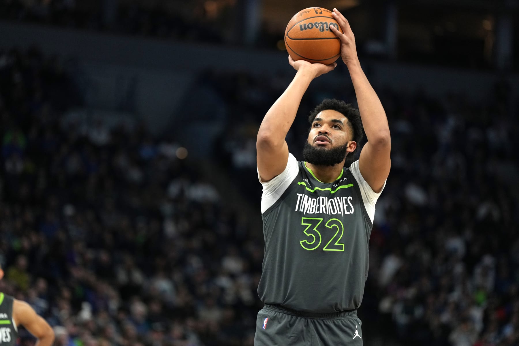 MINNEAPOLIS, MN -  JANUARY 22: Karl-Anthony Towns #32 of the Minnesota Timberwolves shoots a free throw during the game against the Charlotte Hornets on January 22, 2024 at Target Center in Minneapolis, Minnesota. NOTE TO USER: User expressly acknowledges and agrees that, by downloading and or using this Photograph, user is consenting to the terms and conditions of the Getty Images License Agreement. Mandatory Copyright Notice: Copyright 2024 NBAE (Photo by Jordan Johnson/NBAE via Getty Images)