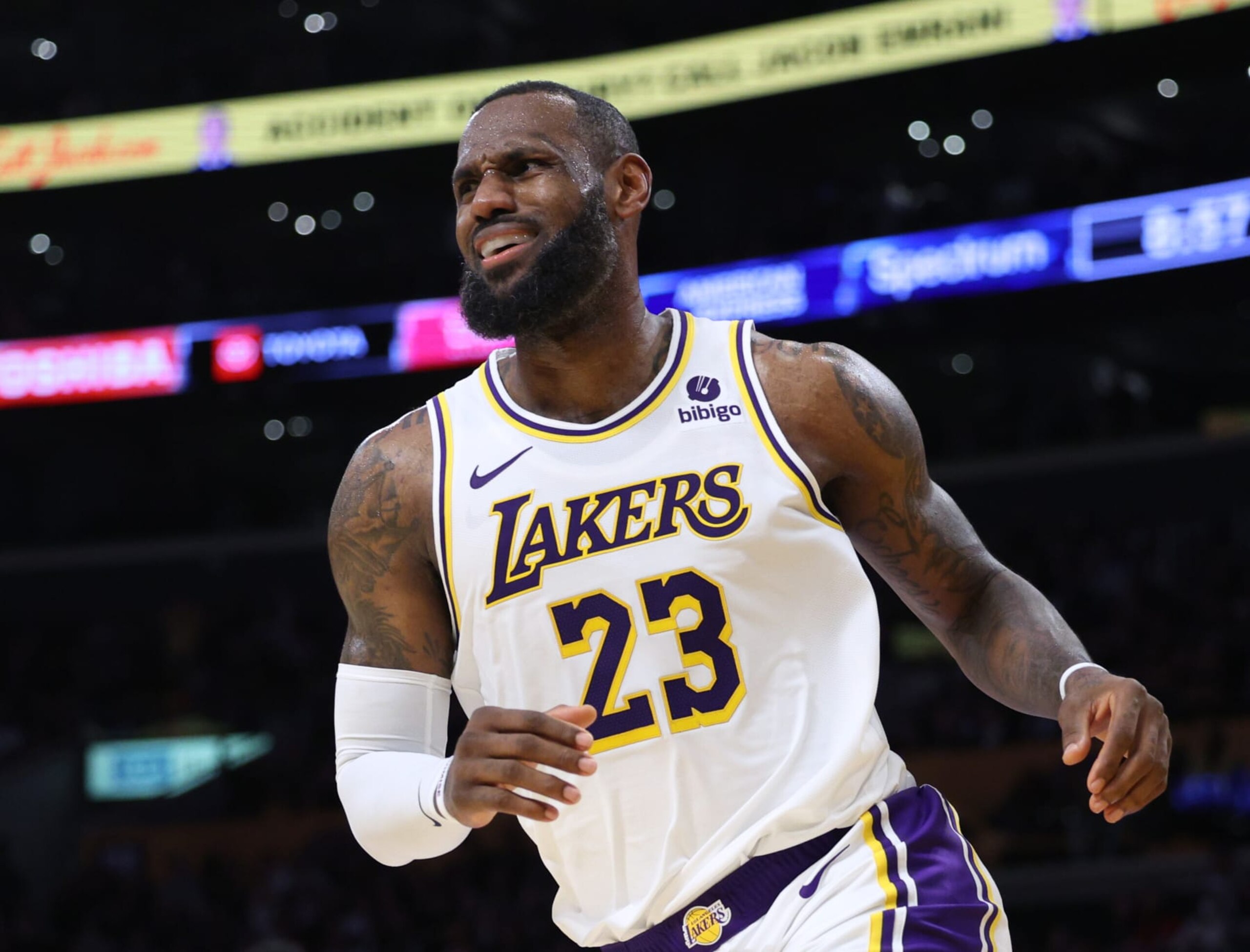 LOS ANGELES, CALIFORNIA - JANUARY 21: LeBron James #23 of the Los Angeles Lakers reacts to a Lakers score during a 134-110 win over the Portland Trail Blazers at Crypto.com Arena on January 21, 2024 in Los Angeles, California. User is consenting to the terms and conditions of the Getty Images License Agreement. (Photo by Harry How/Getty Images)
