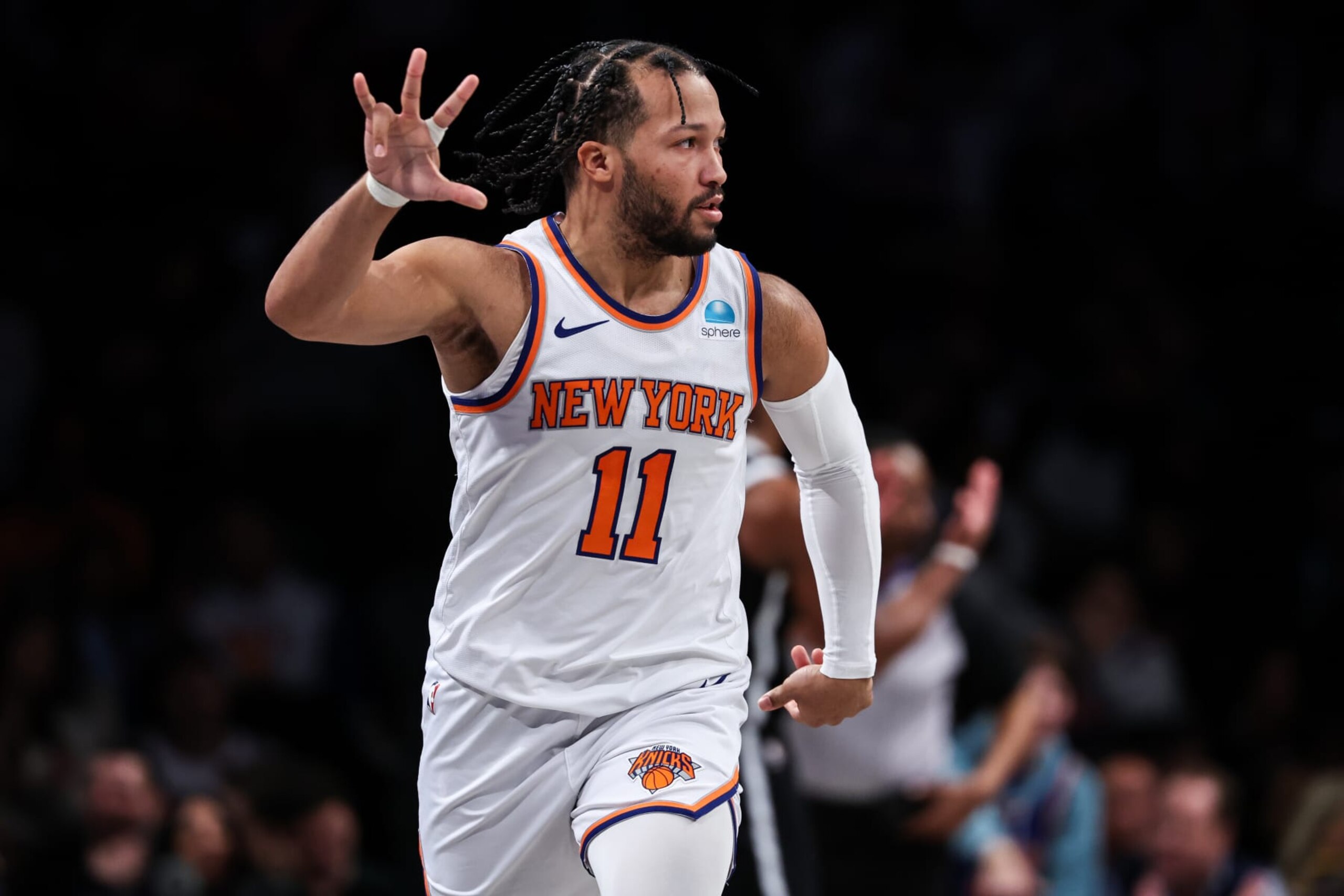 NEW YORK, NEW YORK - JANUARY 23: Jalen Brunson #11 of the New York Knicks reacts after making a three pointer during the second quarter of the game against the Brooklyn Nets at Barclays Center on January 23, 2024 in New York City.  NOTE TO USER: User expressly acknowledges and agrees that, by downloading and or using this photograph, User is consenting to the terms and conditions of the Getty Images License Agreement. (Photo by Dustin Satloff/Getty Images)