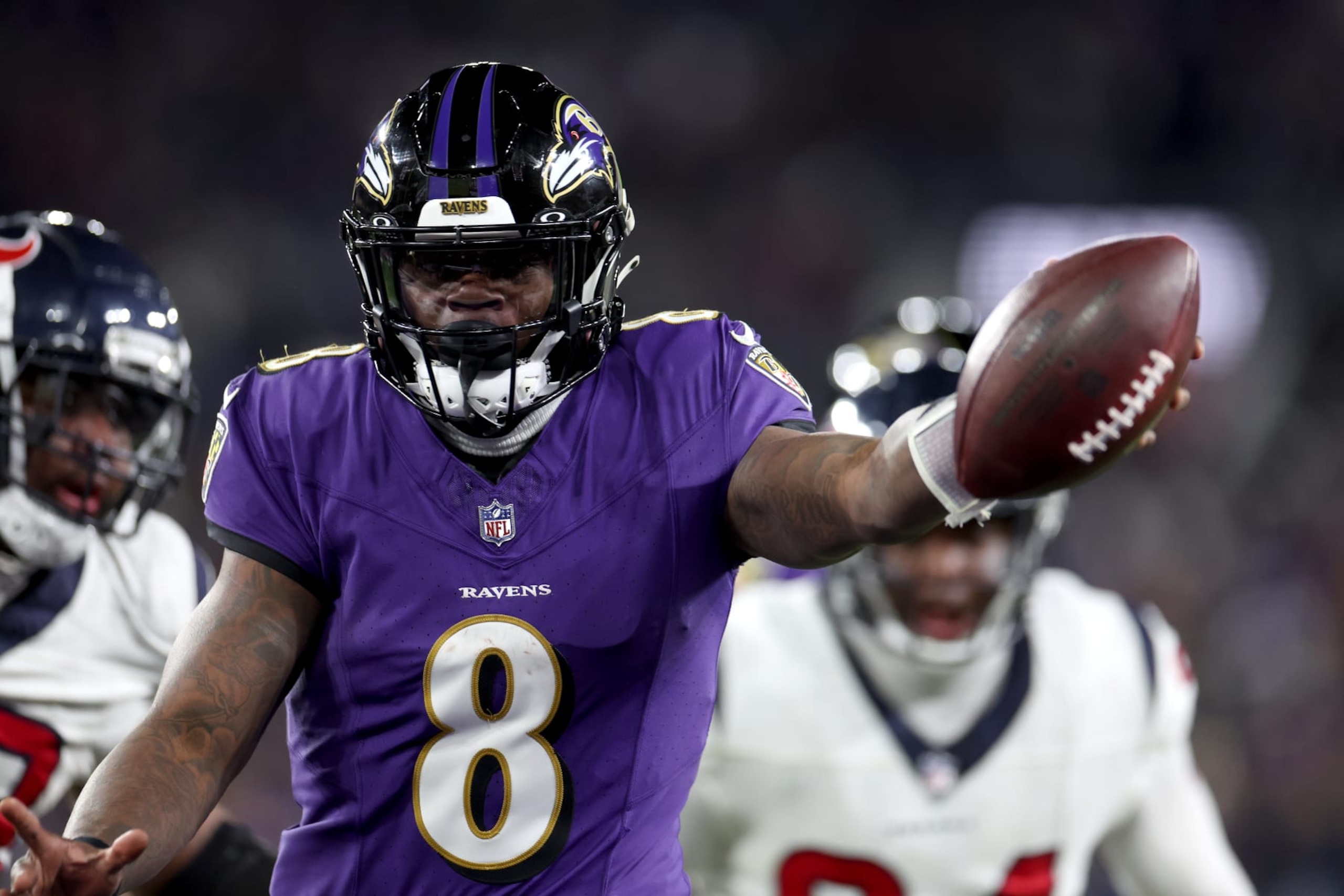 BALTIMORE, MARYLAND - JANUARY 20: Lamar Jackson #8 of the Baltimore Ravens celebrates after rushing for a touchdown against the Houston Texans during the fourth quarter in the AFC Divisional Playoff game at M&T Bank Stadium on January 20, 2024 in Baltimore, Maryland.  (Photo by Rob Carr/Getty Images)