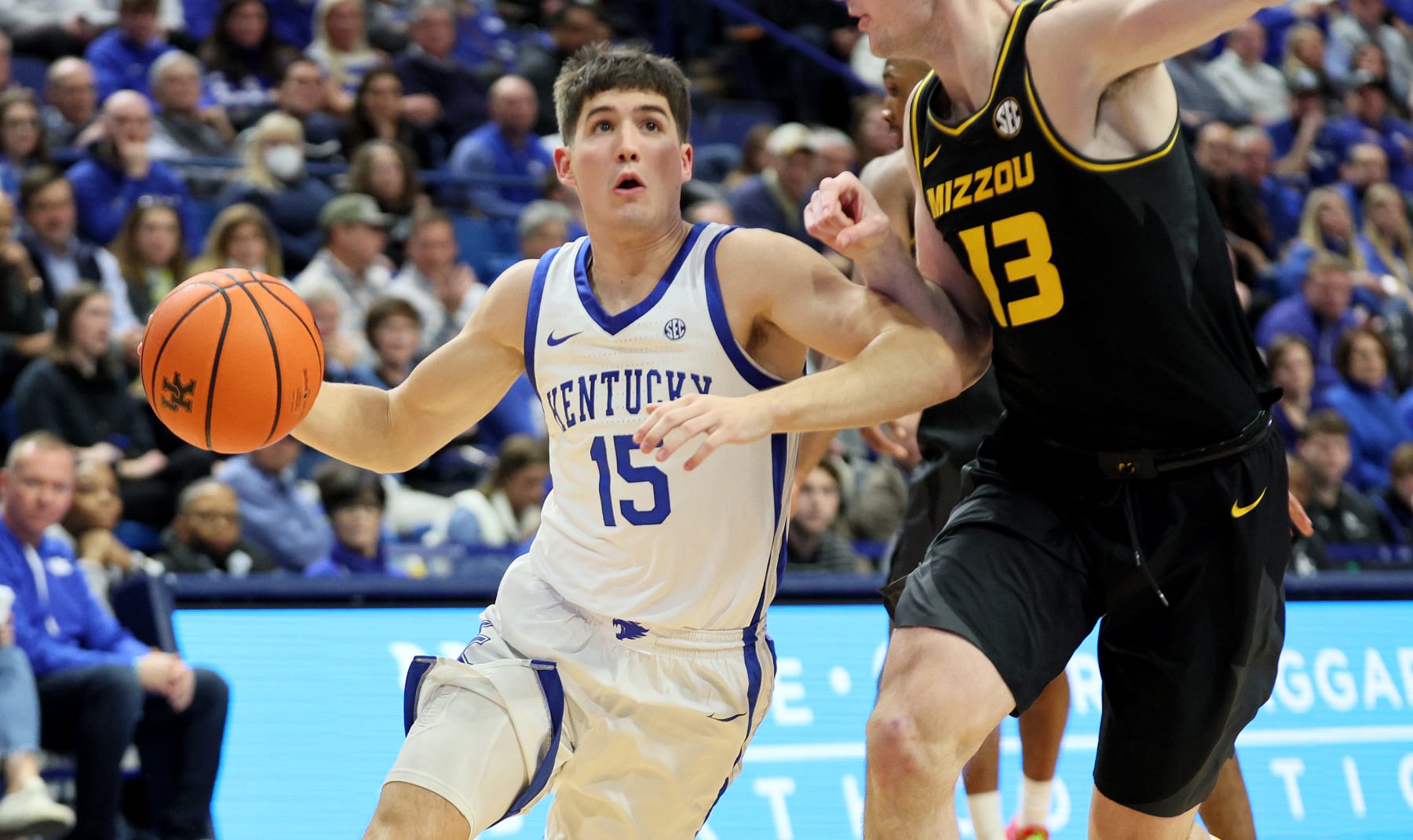 LEXINGTON, KENTUCKY - JANUARY 09: Reed Sheppard #15 of the Kentucky Wildcats dribbles the ball while defended by Jesus Carralero Martin #13 of the Missouri Tigers in the first half at Rupp Arena on January 09, 2024 in Lexington, Kentucky. (Photo by Andy Lyons/Getty Images)