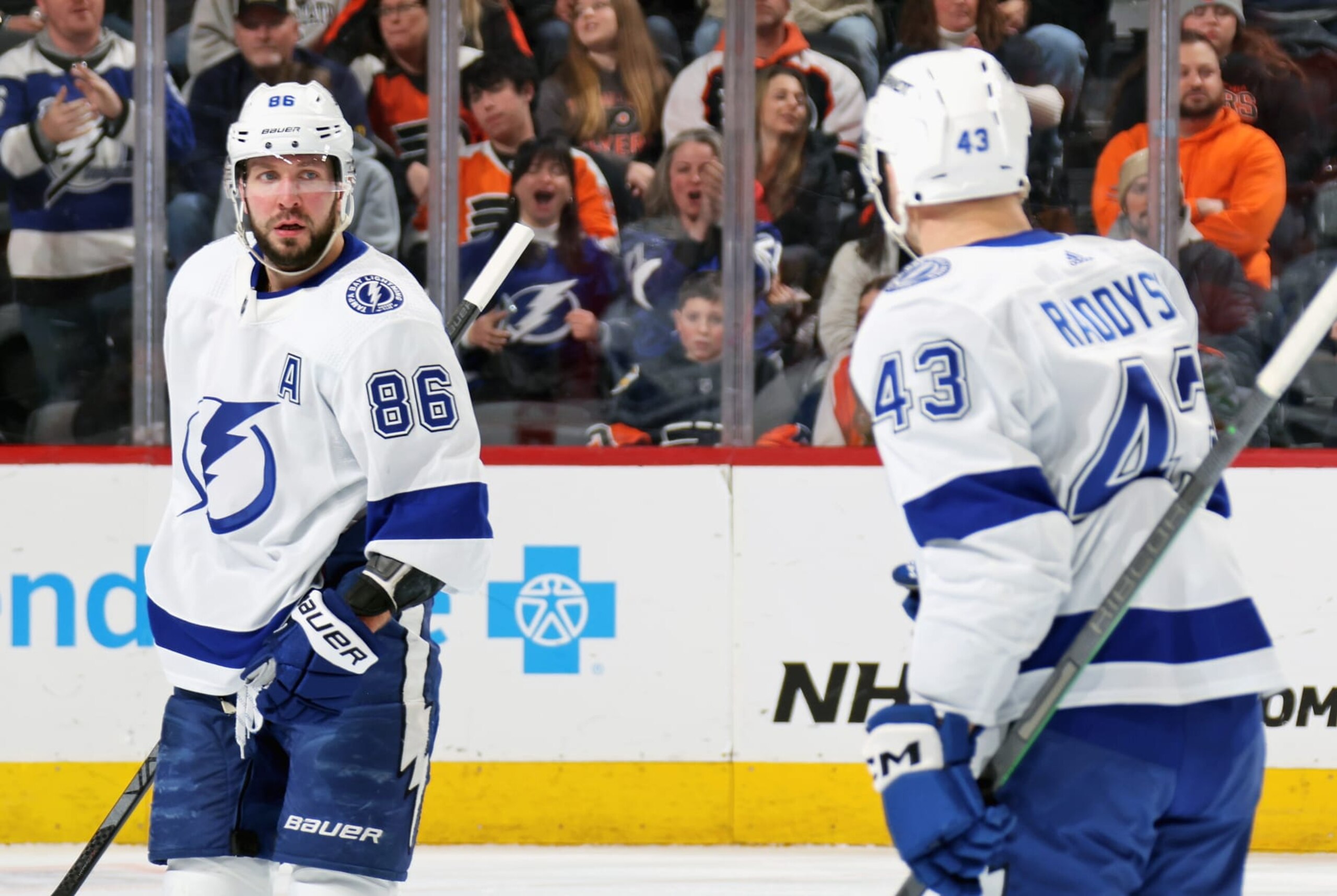 PHILADELPHIA, PENNSYLVANIA - JANUARY 23: Nikita Kucherov #86 of the Tampa Bay Lightning celebrates his first period goal against the Philadelphia Flyers with Darren Raddysh #43 at the Wells Fargo Center on January 23, 2024 in Philadelphia, Pennsylvania.  (Photo by Len Redkoles/NHLI via Getty Images)