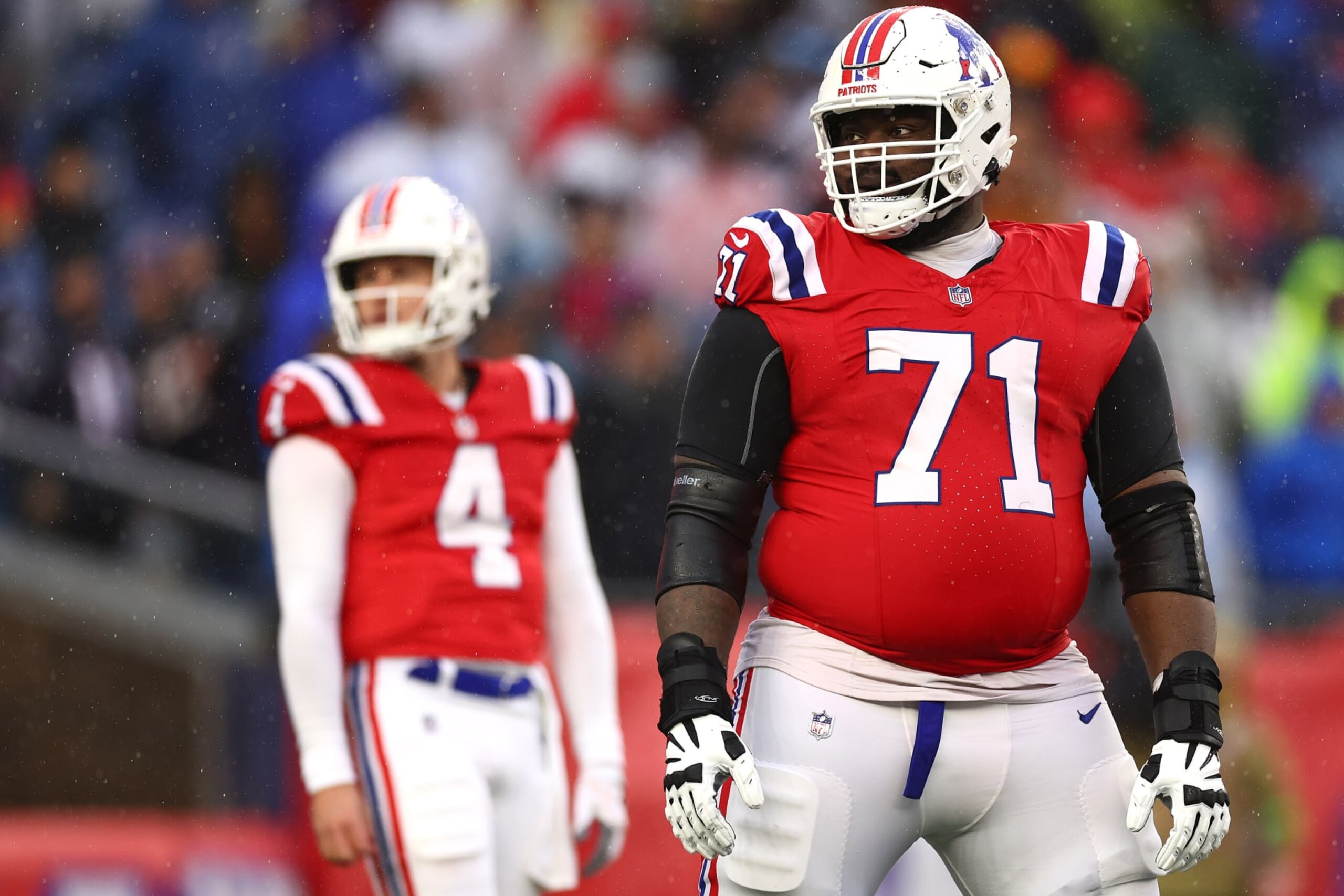 FOXBOROUGH, MASSACHUSETTS - DECEMBER 03: Mike Onwenu #71 of the New England Patriots looks on during the game against the Los Angeles Chargers at Gillette Stadium on December 03, 2023 in Foxborough, Massachusetts. (Photo by Maddie Meyer/Getty Images) FOXBOROUGH, MASSACHUSETTS - DECEMBER 03: Mike Onwenu #71 of the New England Patriots looks on during the game against the Los Angeles Chargers at Gillette Stadium on December 03, 2023 in Foxborough, Massachusetts. (Photo by Maddie Meyer/Getty Images)