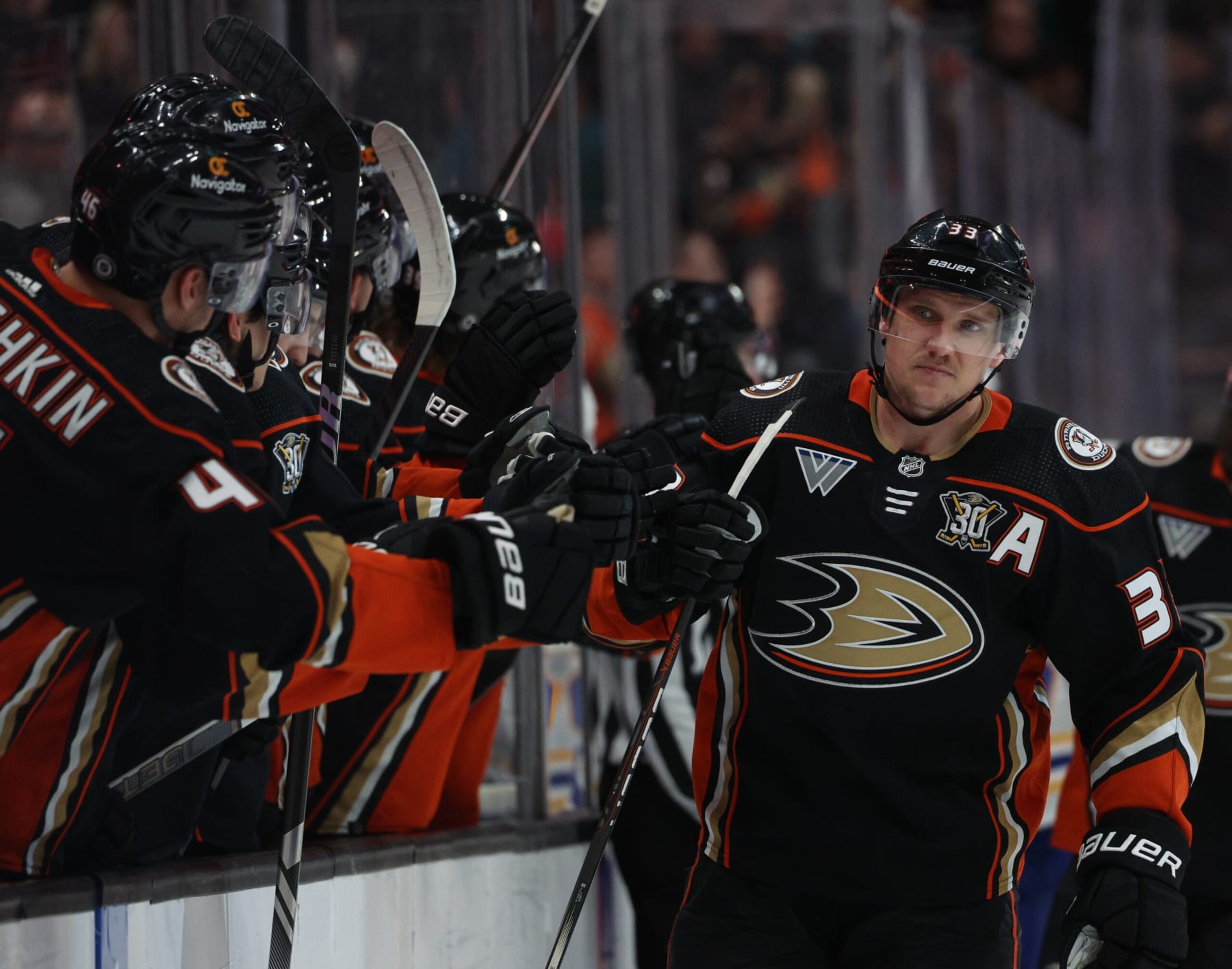 ANAHEIM, CALIFORNIA - JANUARY 23: Jakob Silfverberg #33 of the Anaheim Ducks celebrates his goal with the bench, to take a 1-0 lead over the Buffalo Sabres, during the first period at Honda Center on January 23, 2024 in Anaheim, California. (Photo by Harry How/Getty Images)