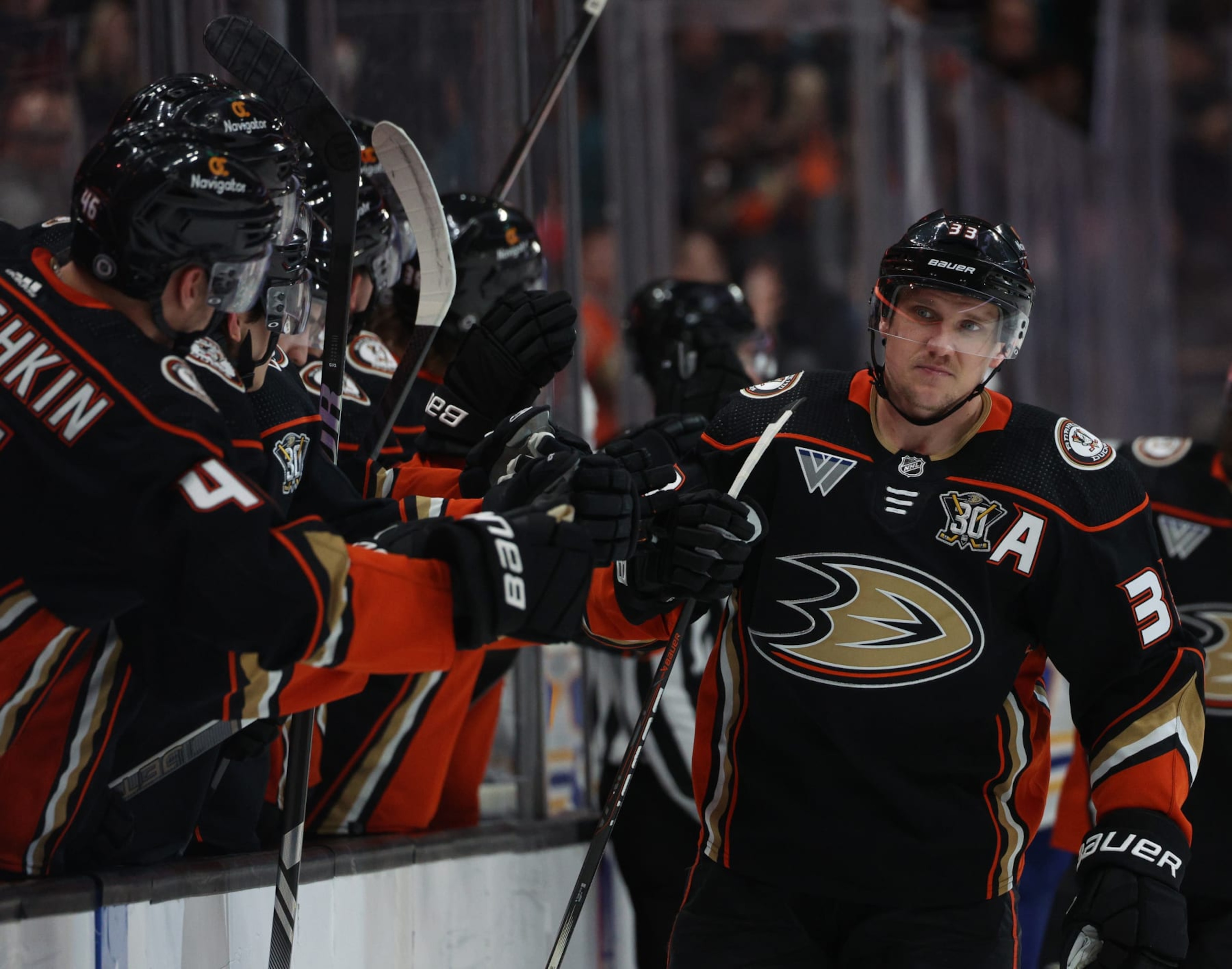 ANAHEIM, CALIFORNIA - JANUARY 23: Jakob Silfverberg #33 of the Anaheim Ducks celebrates his goal with the bench, to take a 1-0 lead over the Buffalo Sabres, during the first period at Honda Center on January 23, 2024 in Anaheim, California. (Photo by Harry How/Getty Images)