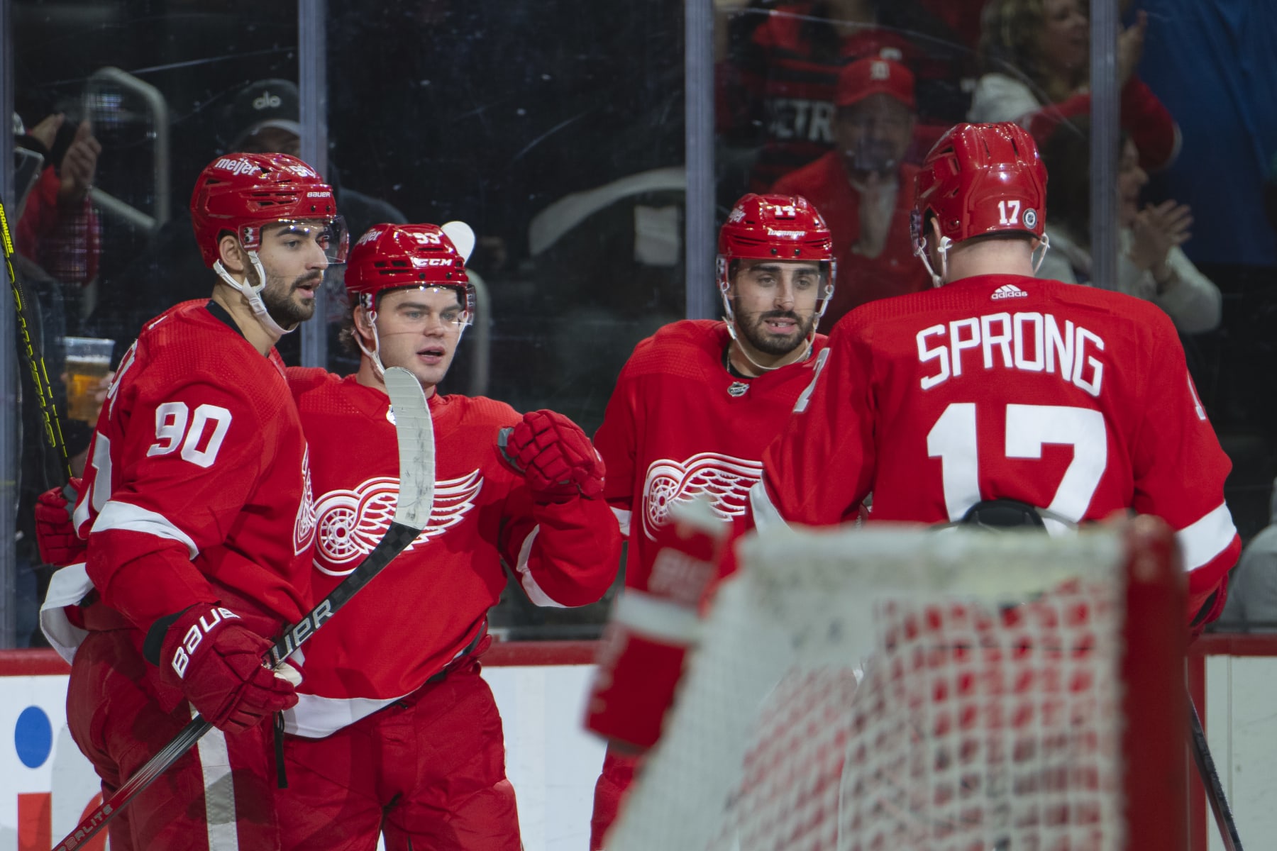 DETROIT, MI - JANUARY 23: Alex DeBrincat #93 of the Detroit Red Wings celebrates his goal with teammates during the first period against the Dallas Stars at Little Caesars Arena on January 23, 2024 in Detroit, Michigan. (Photo by Darren Clark/NHLI via Getty Images)