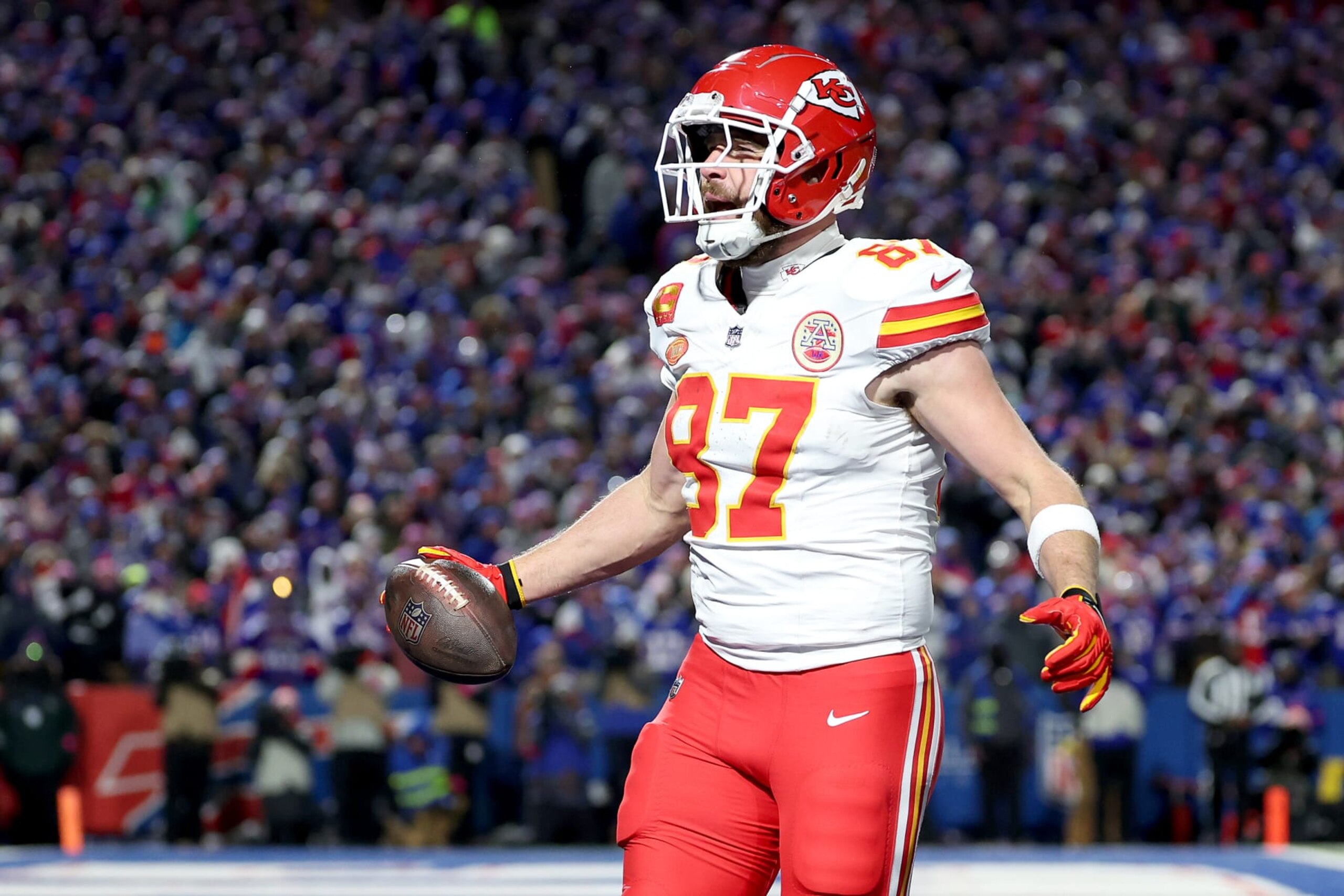 ORCHARD PARK, NEW YORK - JANUARY 21: Travis Kelce #87 of the Kansas City Chiefs celebrates after scoring a 22 yard touchdown against the Buffalo Bills during the second quarter in the AFC Divisional Playoff game at Highmark Stadium on January 21, 2024 in Orchard Park, New York. (Photo by Al Bello/Getty Images) ORCHARD PARK, NEW YORK - JANUARY 21: Travis Kelce #87 of the Kansas City Chiefs celebrates after scoring a 22 yard touchdown against the Buffalo Bills during the second quarter in the AFC Divisional Playoff game at Highmark Stadium on January 21, 2024 in Orchard Park, New York. (Photo by Al Bello/Getty Images)