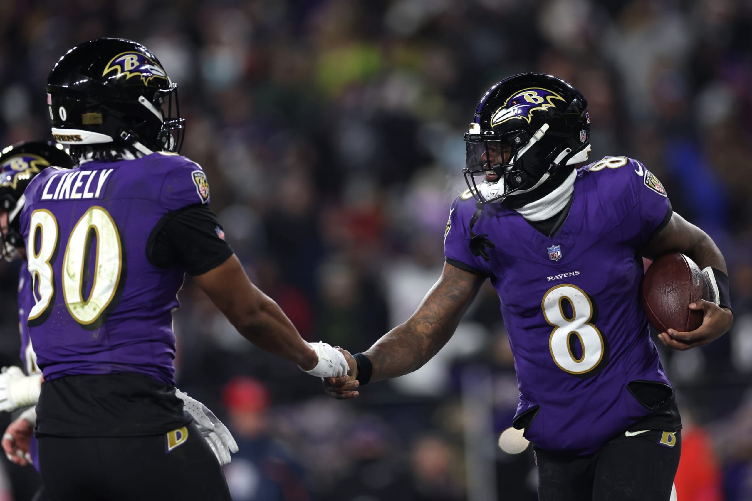 BALTIMORE, MARYLAND - JANUARY 20: Quarterback Lamar Jackson #8 of the Baltimore Ravens celebrates his touchdown against the Houston Texans during the fourth quarter in the AFC Divisional Playoff game at M&T Bank Stadium on January 20, 2024 in Baltimore, Maryland. (Photo by Patrick Smith/Getty Images) BALTIMORE, MARYLAND - JANUARY 20: Quarterback Lamar Jackson #8 of the Baltimore Ravens celebrates his touchdown against the Houston Texans during the fourth quarter in the AFC Divisional Playoff game at M&T Bank Stadium on January 20, 2024 in Baltimore, Maryland. (Photo by Patrick Smith/Getty Images)