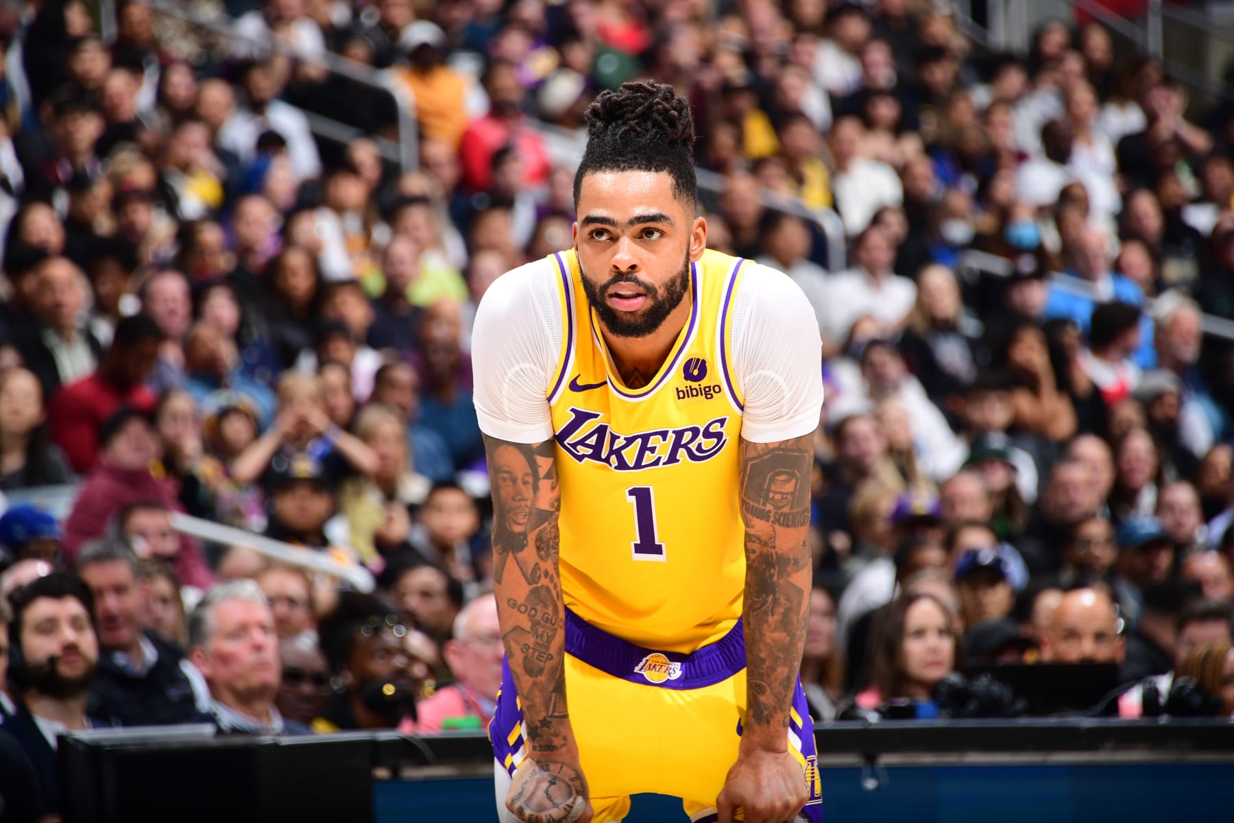 LOS ANGELES, CA - JANUARY 23:  D'Angelo Russell #1 of the Los Angeles Lakers look on during the game on January 23, 2024 at Crypto.Com Arena in Los Angeles, California. NOTE TO USER: User expressly acknowledges and agrees that, by downloading and/or using this Photograph, user is consenting to the terms and conditions of the Getty Images License Agreement. Mandatory Copyright Notice: Copyright 2024 NBAE (Photo by Adam Pantozzi/NBAE via Getty Images)