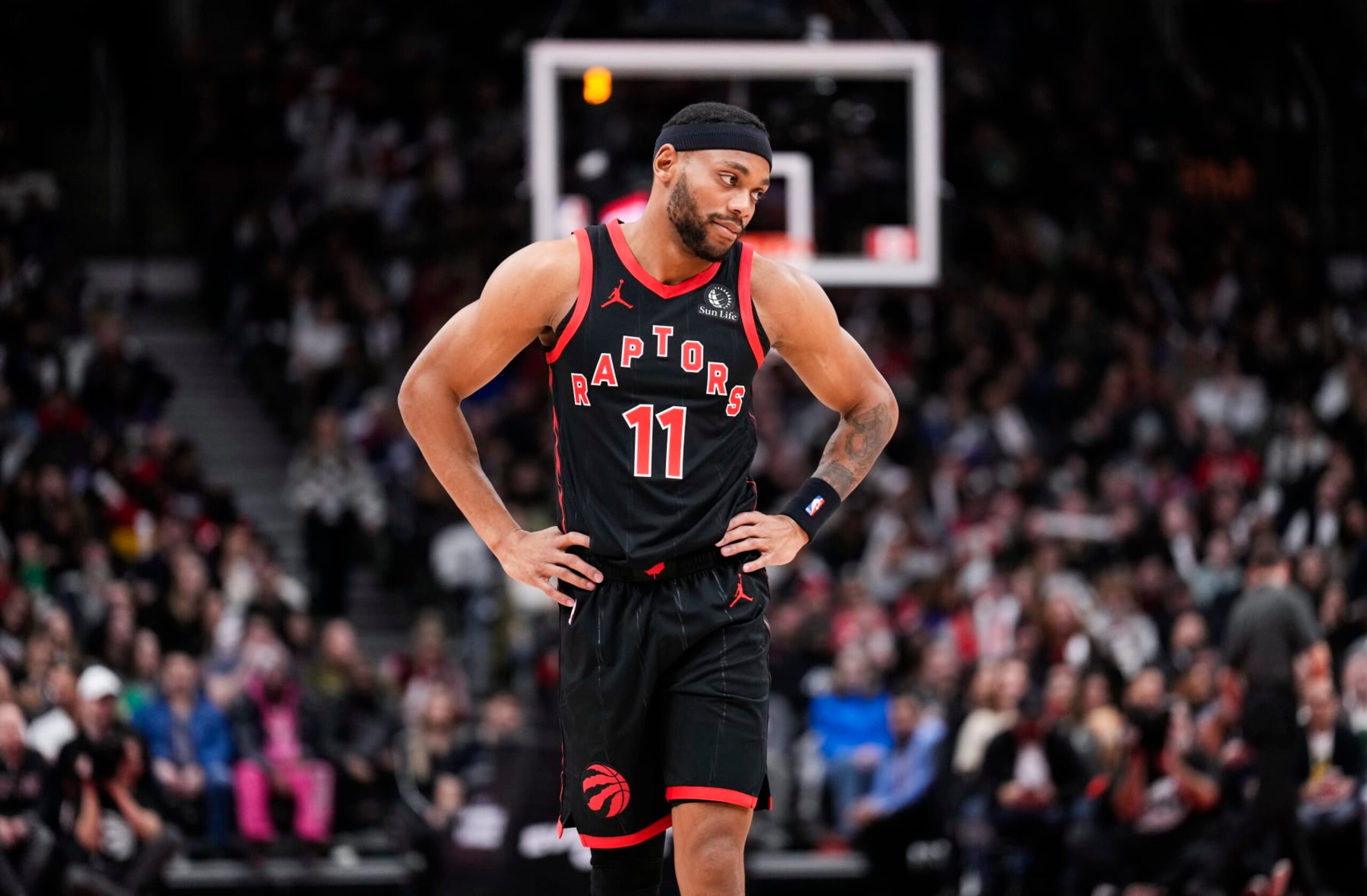 TORONTO, ON - JANUARY 18: Bruce Brown #11 of the Toronto Raptors looks on against the Toronto Raptors during the first half of their basketball game at the Scotiabank Arena on January 18, 2024 in Toronto, Ontario, Canada. NOTE TO USER: User expressly acknowledges and agrees that, by downloading and/or using this Photograph, user is consenting to the terms and conditions of the Getty Images License Agreement. (Photo by Mark Blinch/Getty Images)