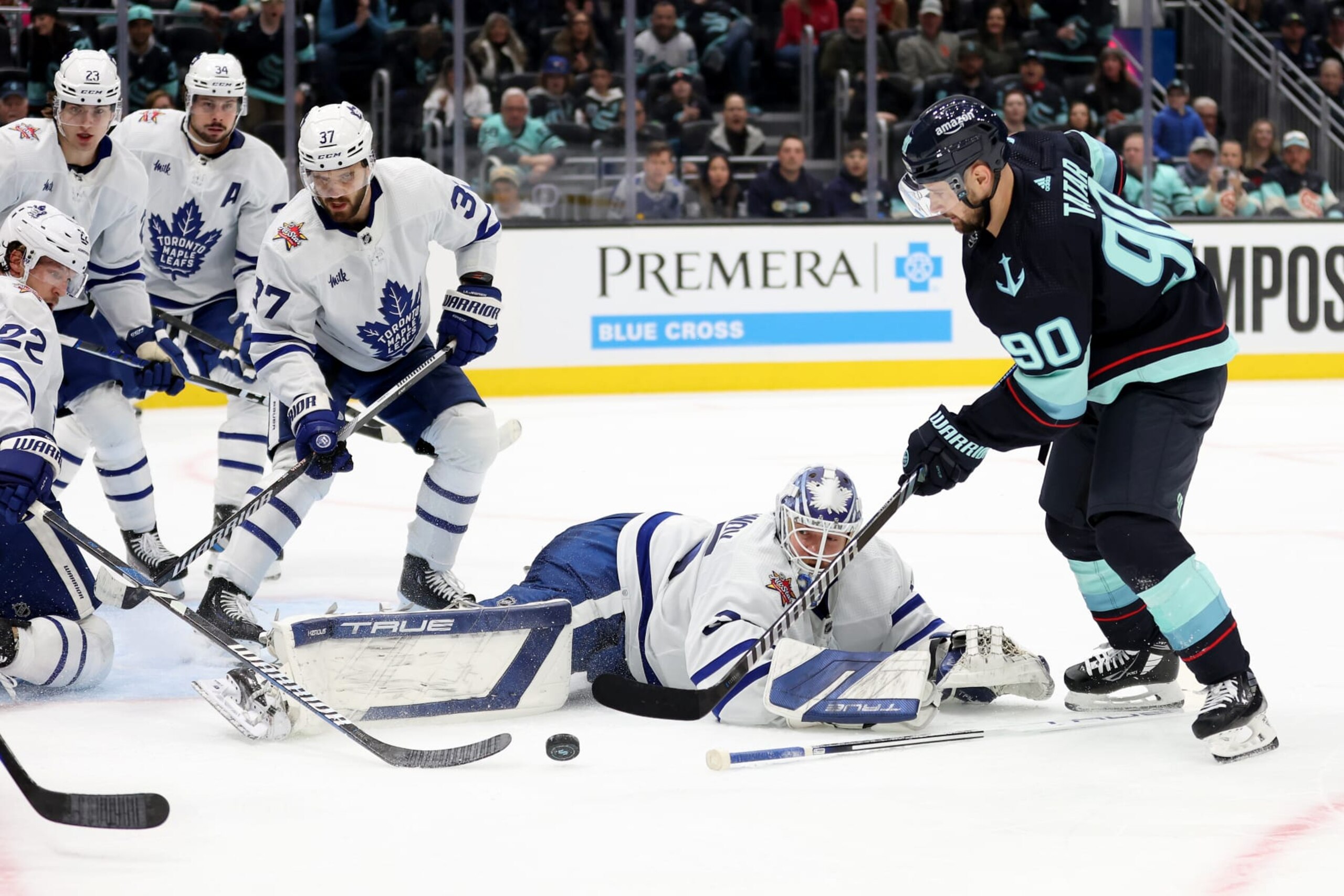 SEATTLE, WASHINGTON - JANUARY 21: Ilya Samsonov #35 of the Toronto Maple Leafs makes a save against Tomas Tatar #90 of the Seattle Kraken during the second period at Climate Pledge Arena on January 21, 2024 in Seattle, Washington. (Photo by Steph Chambers/Getty Images)